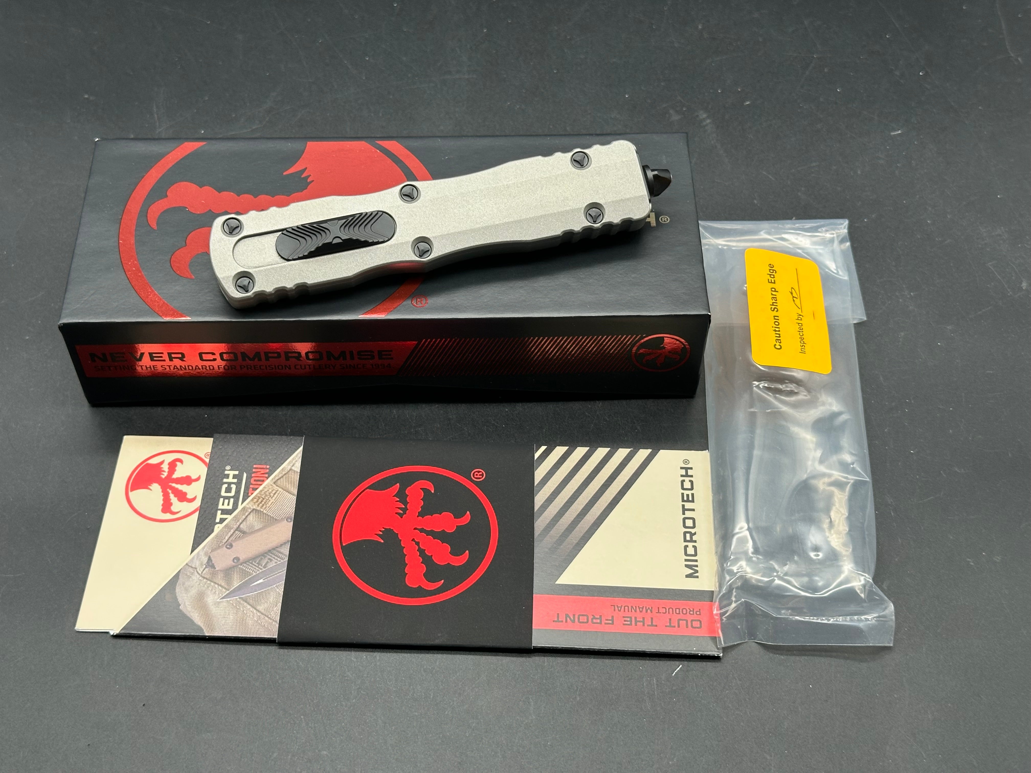 Microtech 227-1TG Dirac Delta AUTO OTF Knife 3.79" Black Double Edge Dagger Blade, Titanium Gray Aluminum Handles