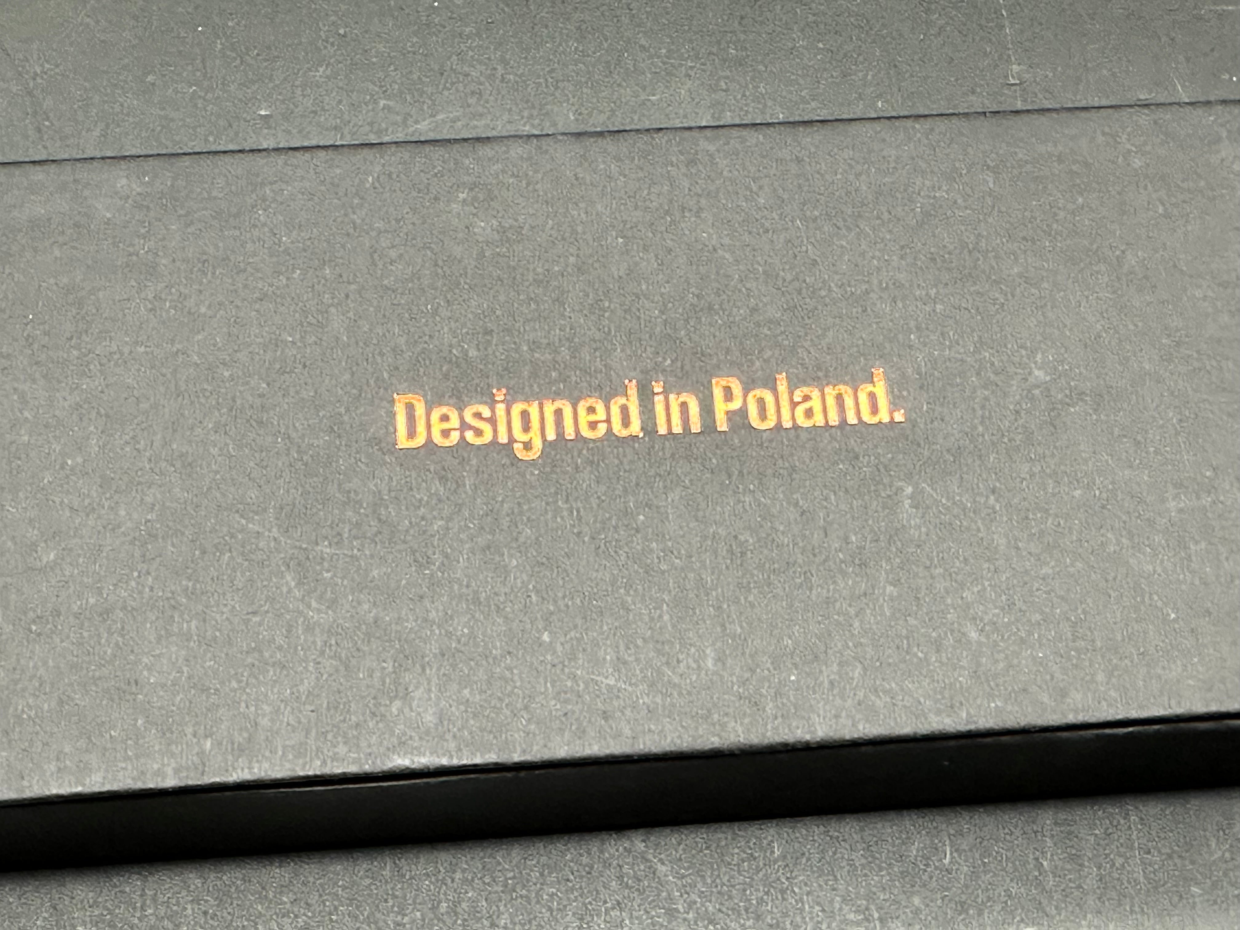 The Matsey + Kombou Lynx Grey Ti Handle + Gold Marble CF w/ Gold Ano Accents/Drop Point/Satin Mangnacut