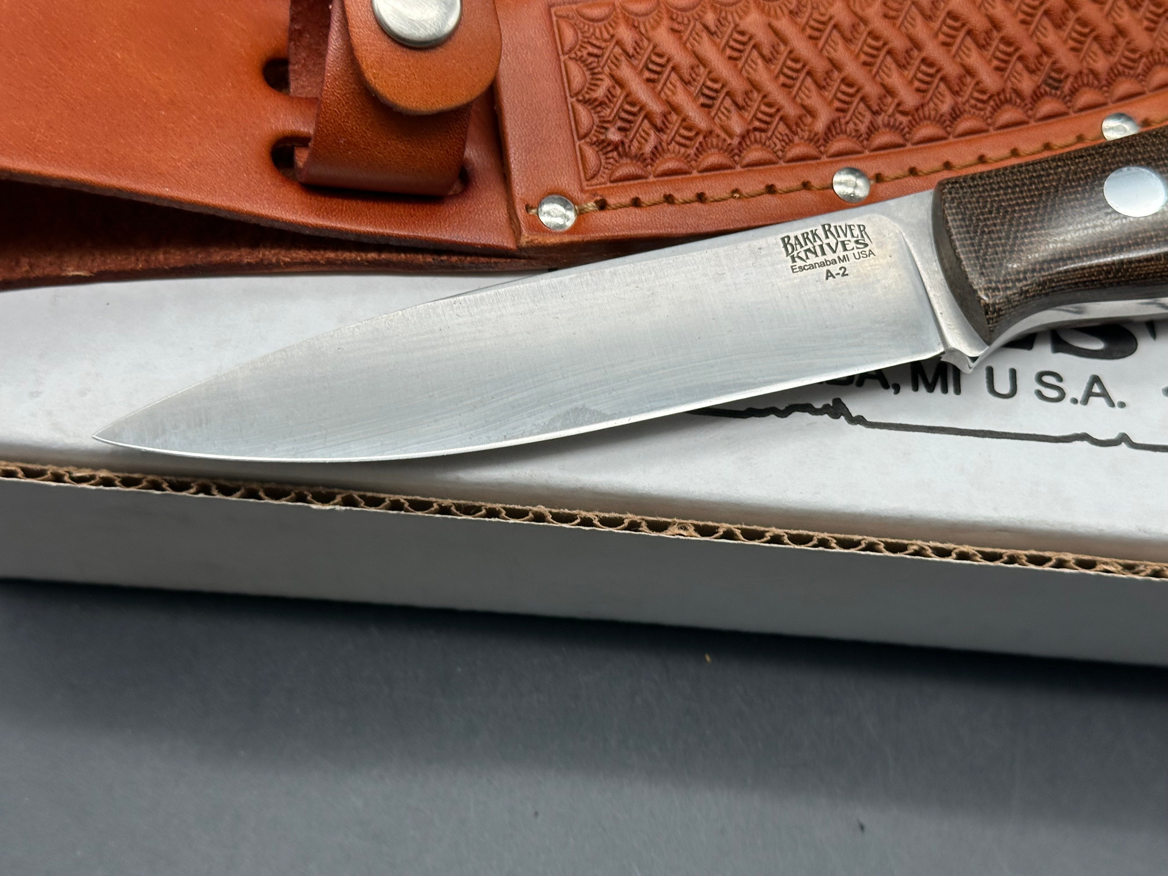 Bark River Aurora green canvas micarta scales, A-2 tool steel blade, brown leather sheath