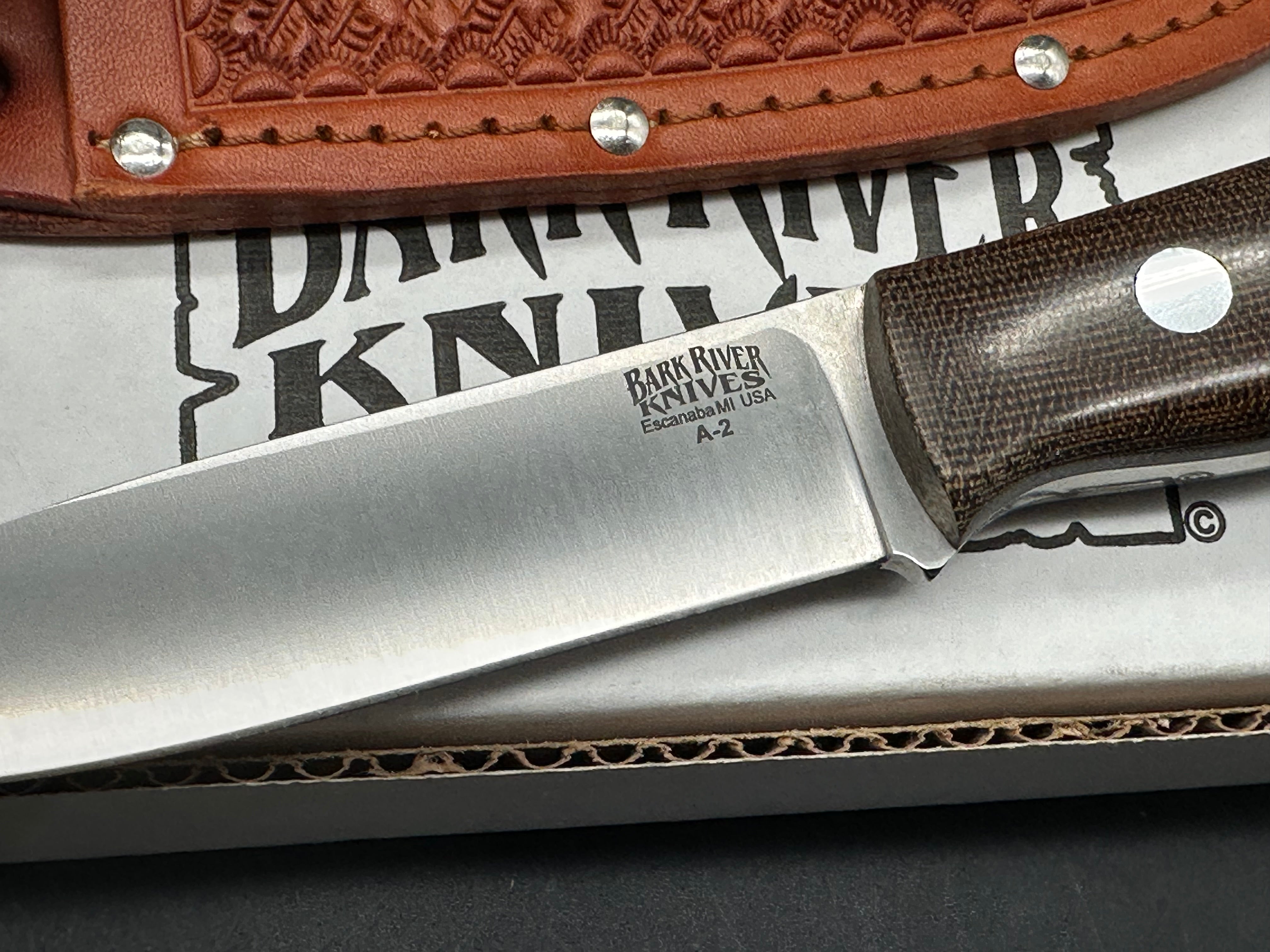 Bark River Aurora green canvas micarta scales, A-2 tool steel blade, brown leather sheath
