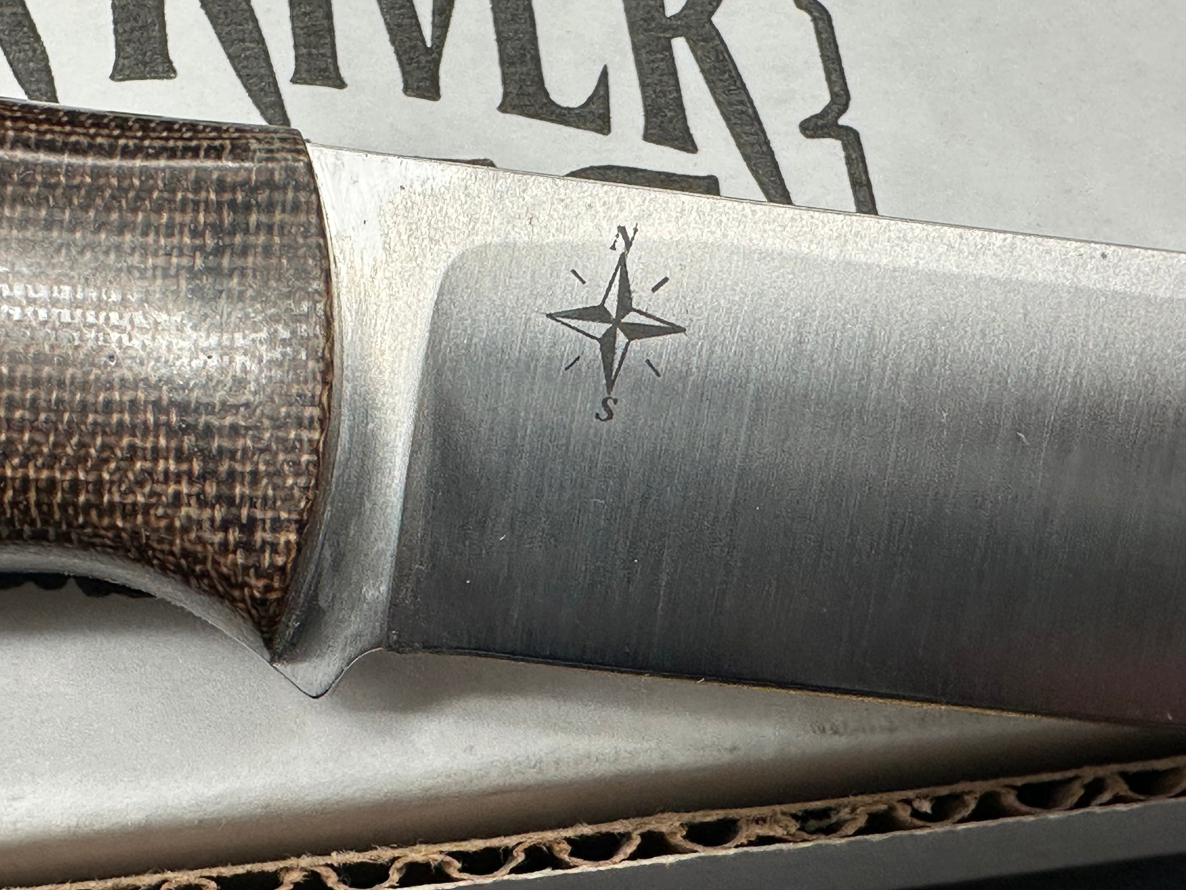 Bark River Aurora green canvas micarta scales, A-2 tool steel blade, brown leather sheath