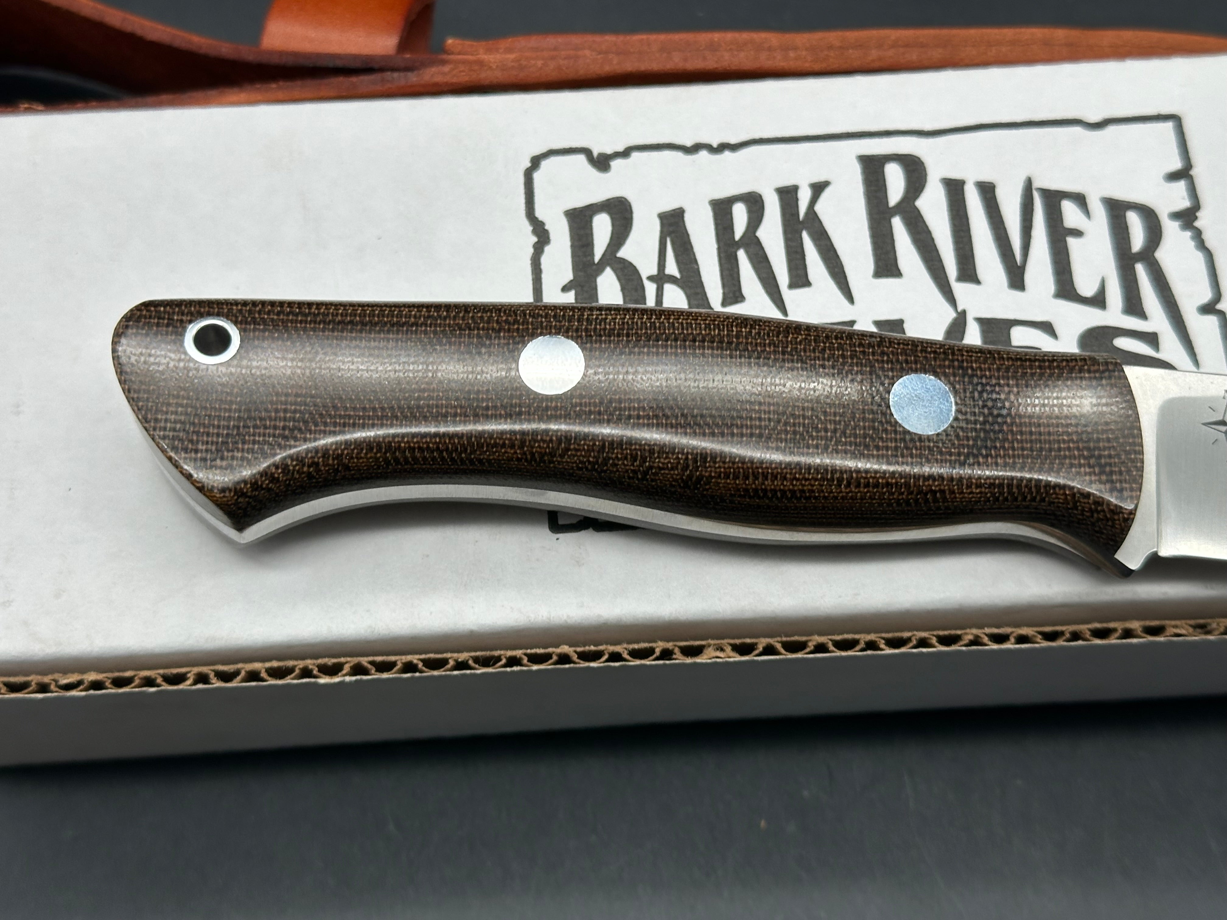 Bark River Aurora green canvas micarta scales, A-2 tool steel blade, brown leather sheath