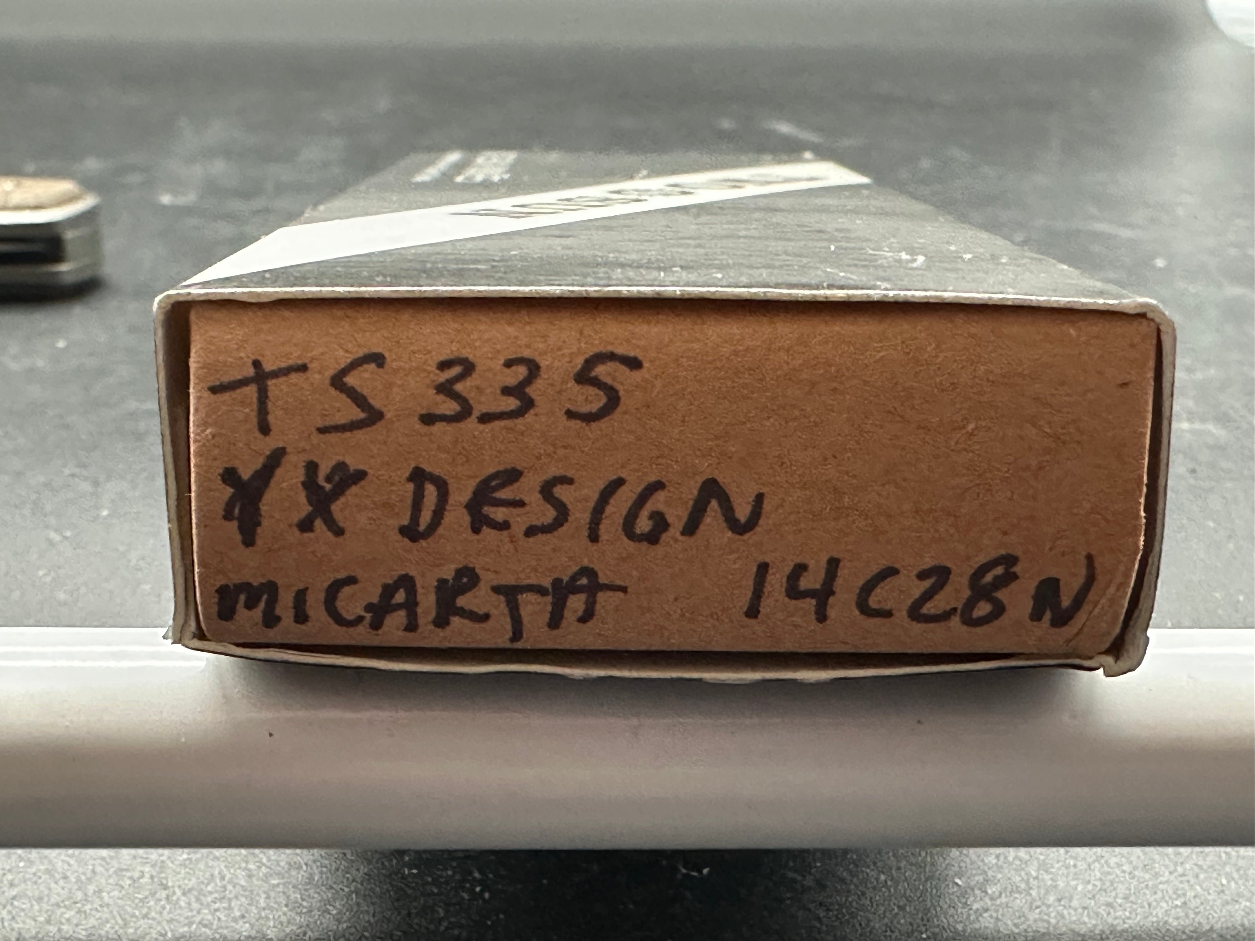 Twosun TS335 YX design double detent slip joint, titanium and micarta scales, Sandv