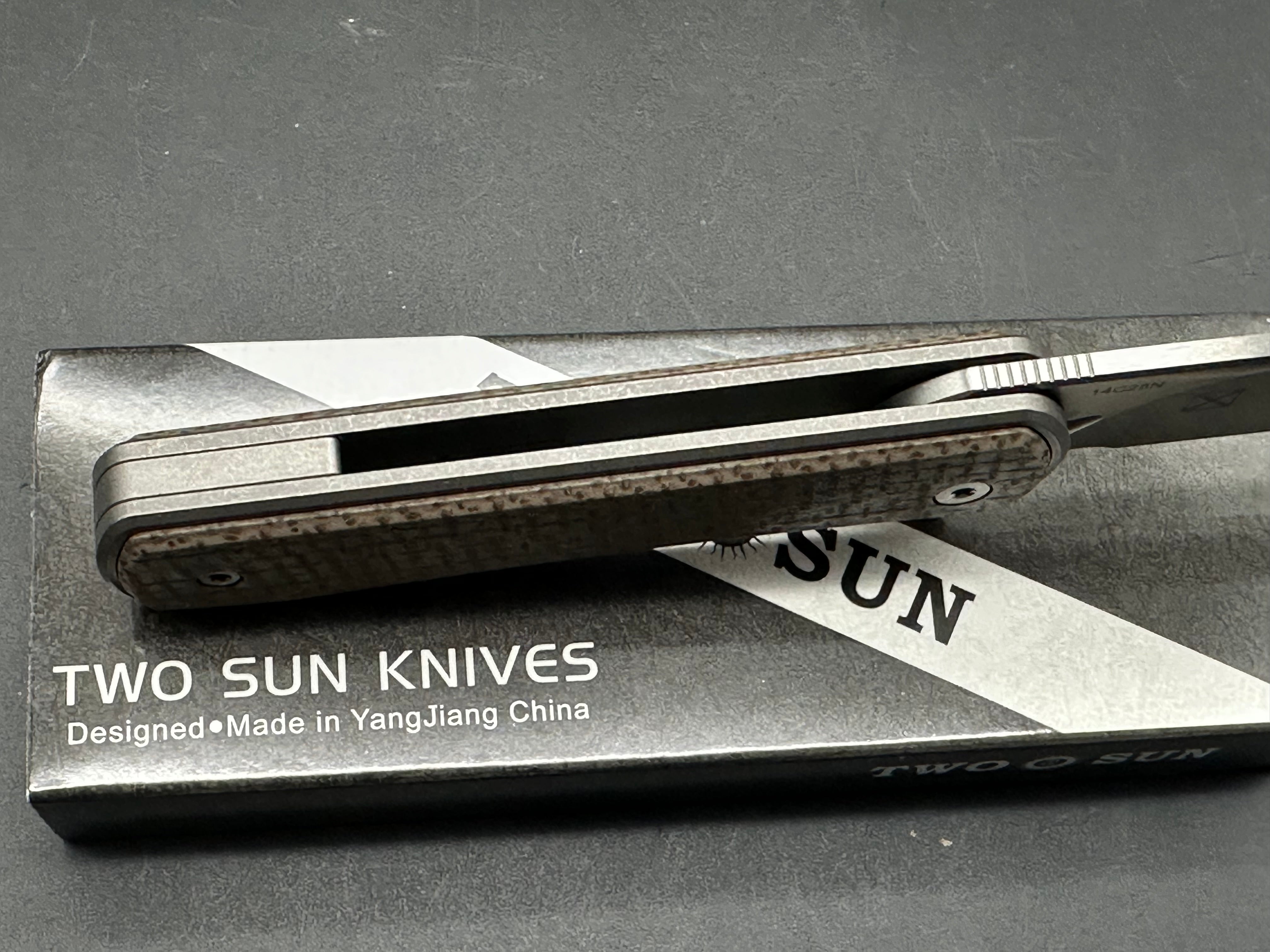 Twosun TS335 YX design double detent slip joint, titanium and micarta scales, Sandv