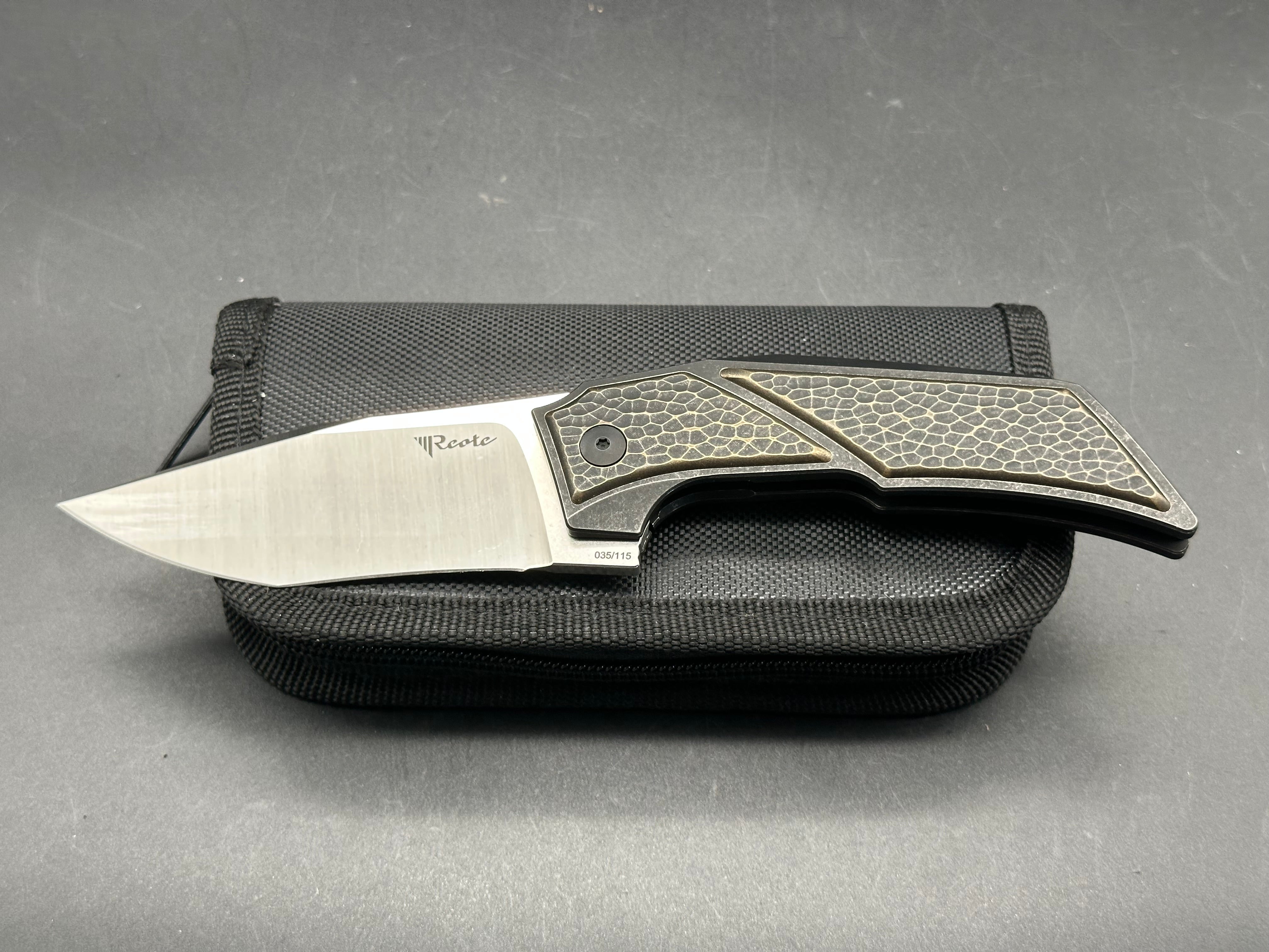 Reate Knives + Tashi Bharucha - T3500/Bronze Ti Frame + Texture Brass Inlays
