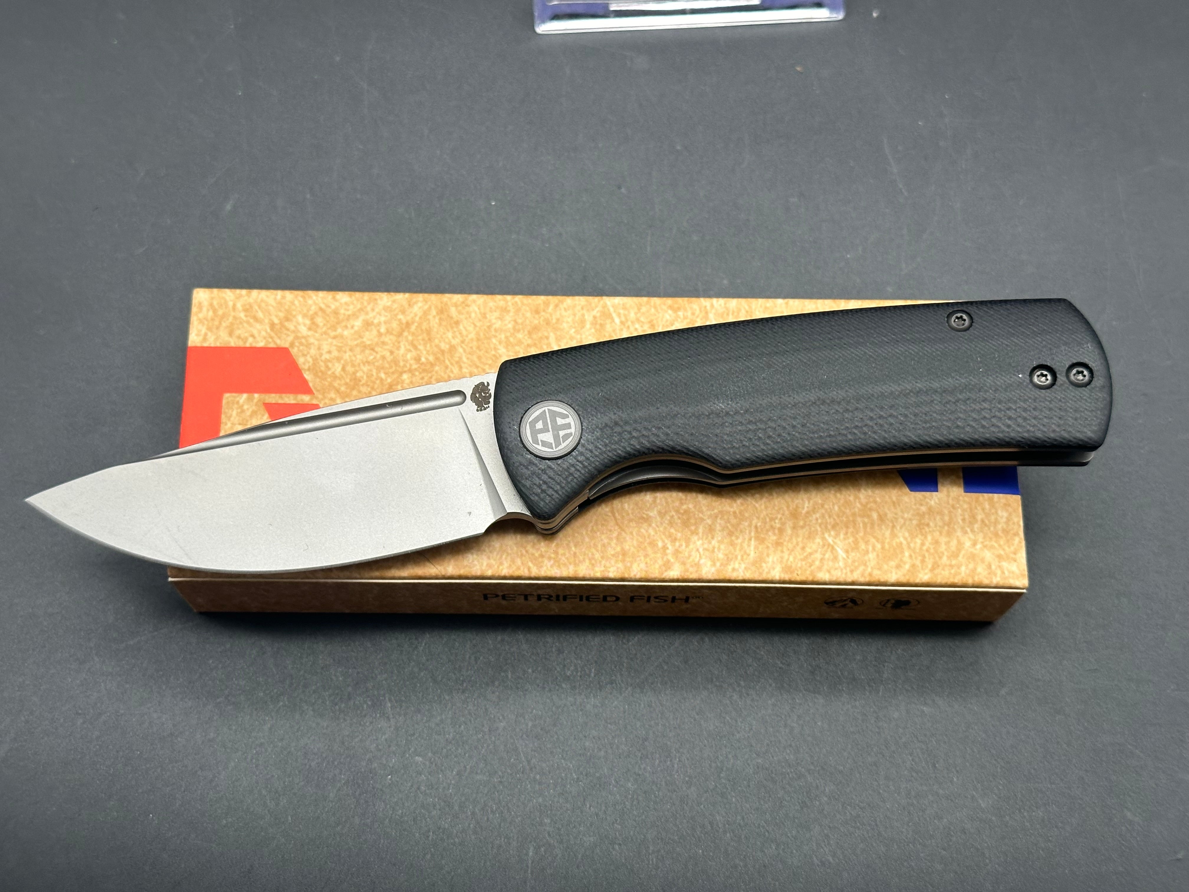 PETRIFIED FISH MINI BELUGA FOLDING KNIFE BLACK G10 HANDLE 14C28N PLAIN