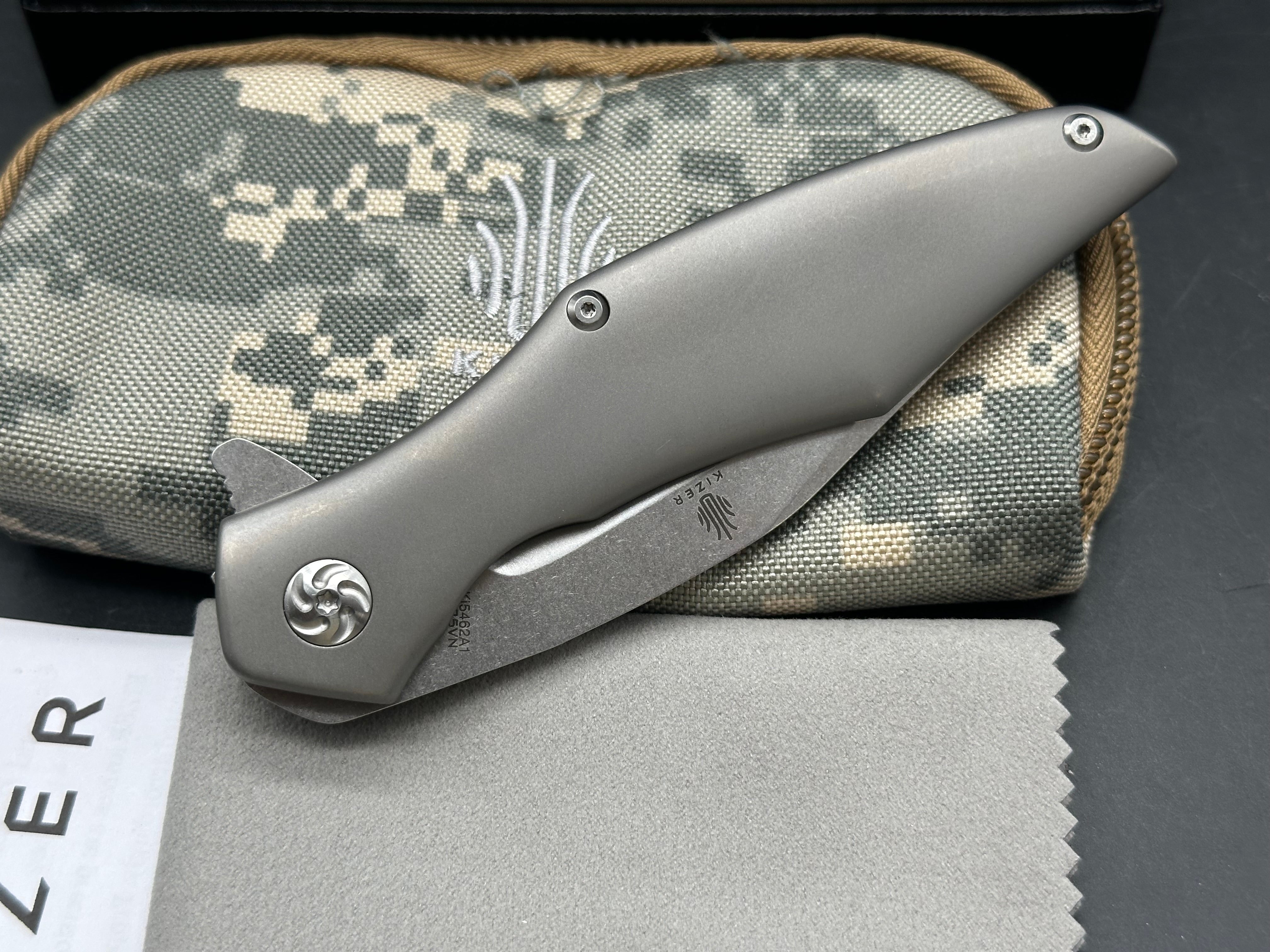 Kizer Trifecta: Matt Cuchiara design. 3.875 stonewash, drop point, hollow grind CPM-S35VN blade. Titanium handle with milled titanium clip