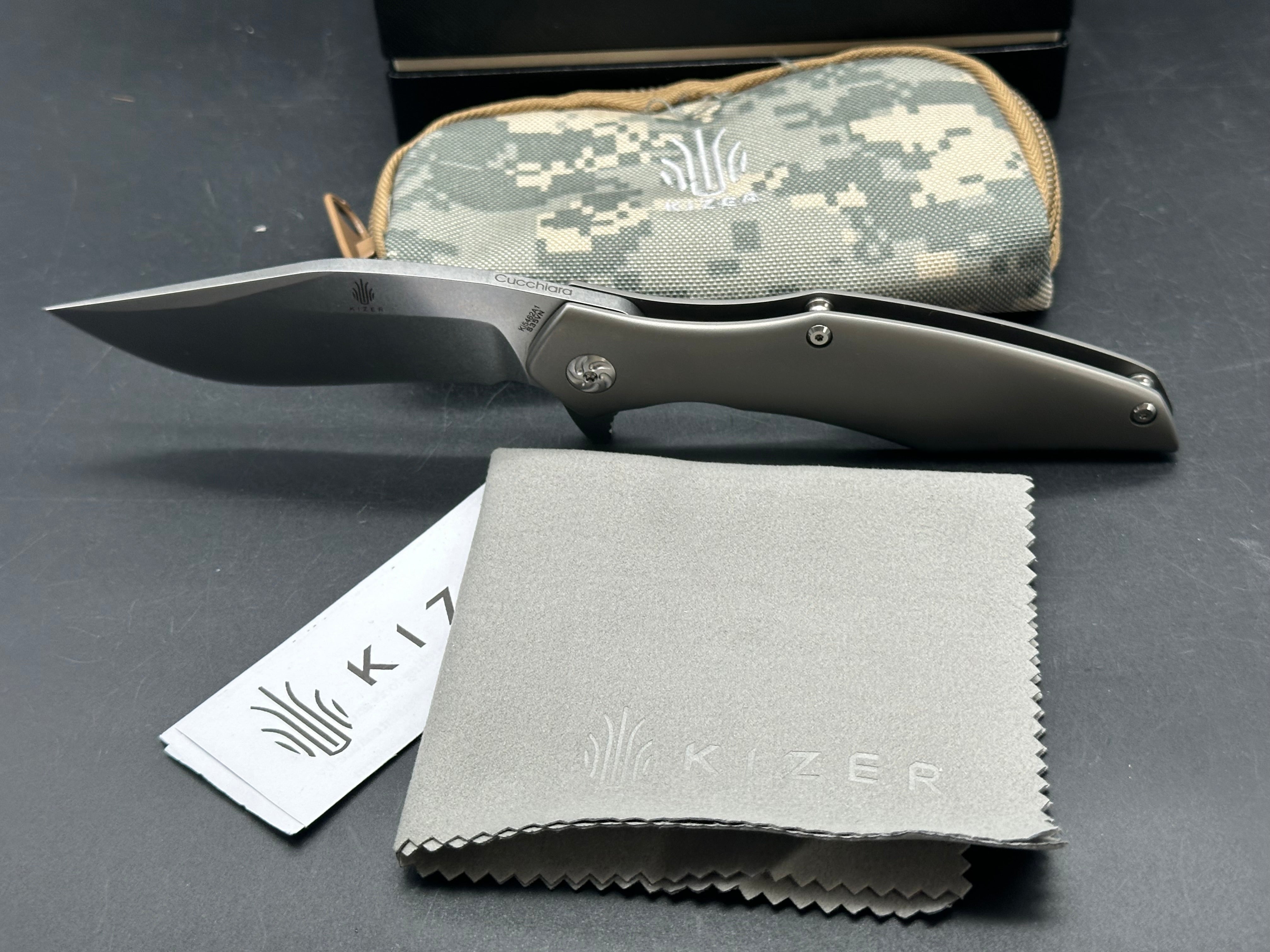 Kizer Trifecta: Matt Cuchiara design. 3.875 stonewash, drop point, hollow grind CPM-S35VN blade. Titanium handle with milled titanium clip