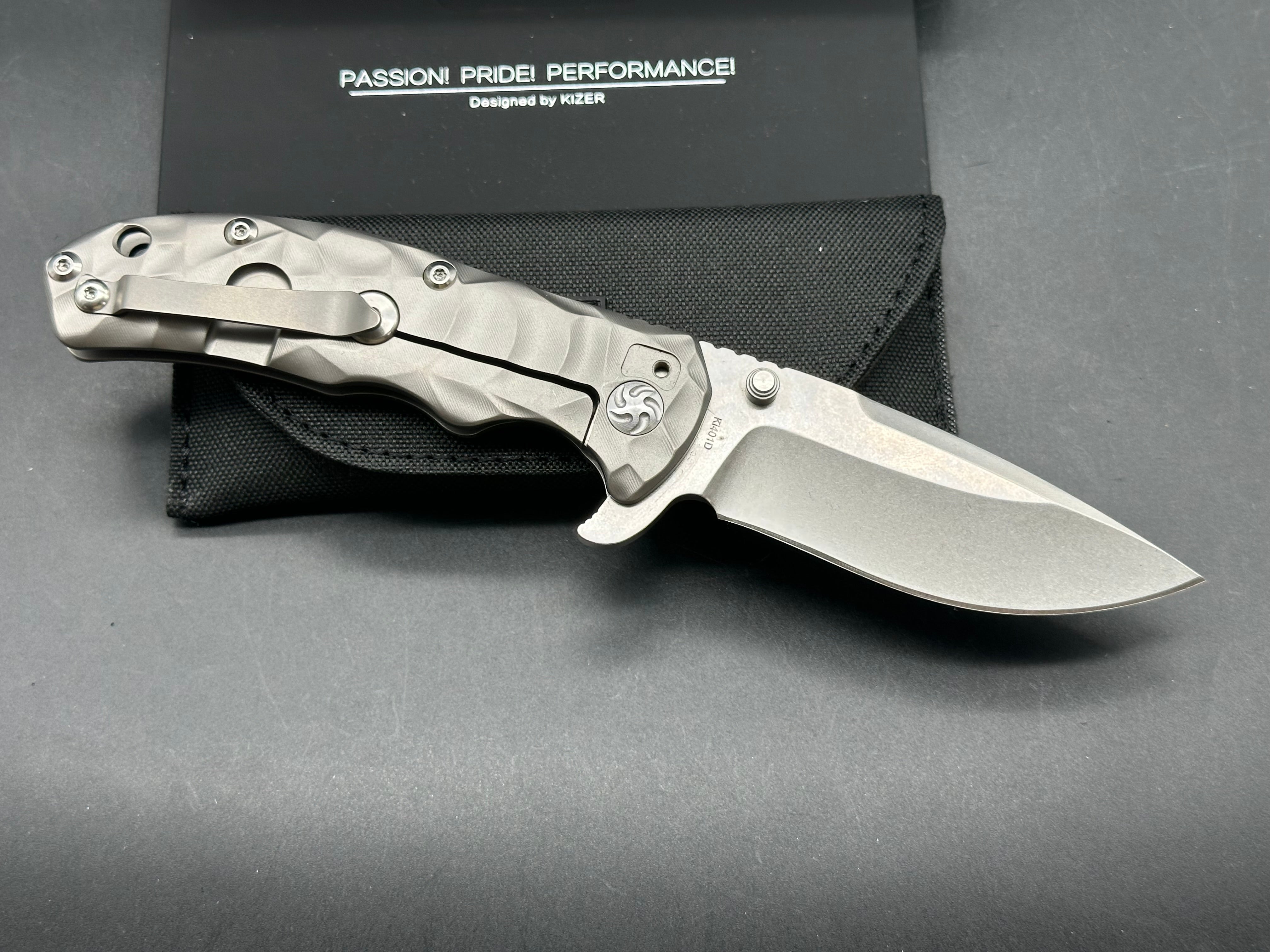Kizer Caligine 3.58 inch stonewash, drop point, flat grind CPM-S35VN blade. Frame lock. Titanium handle. Titanium clip