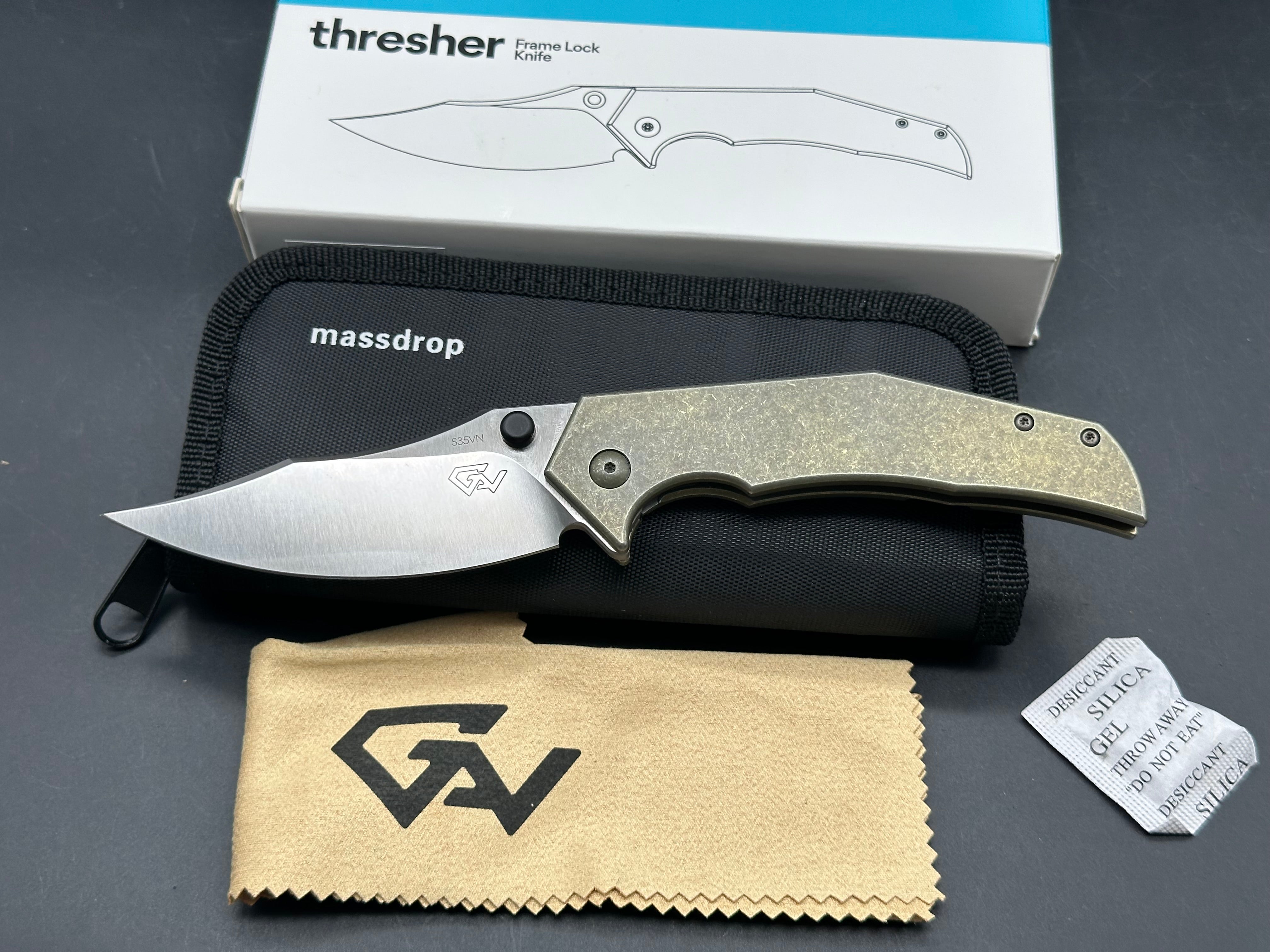 Massdrop Gavko Thresher: Gavko design. 3.5 inch satin finish, clip point CPM-S35VN blade. Tumbled and anodized copper titanium frame