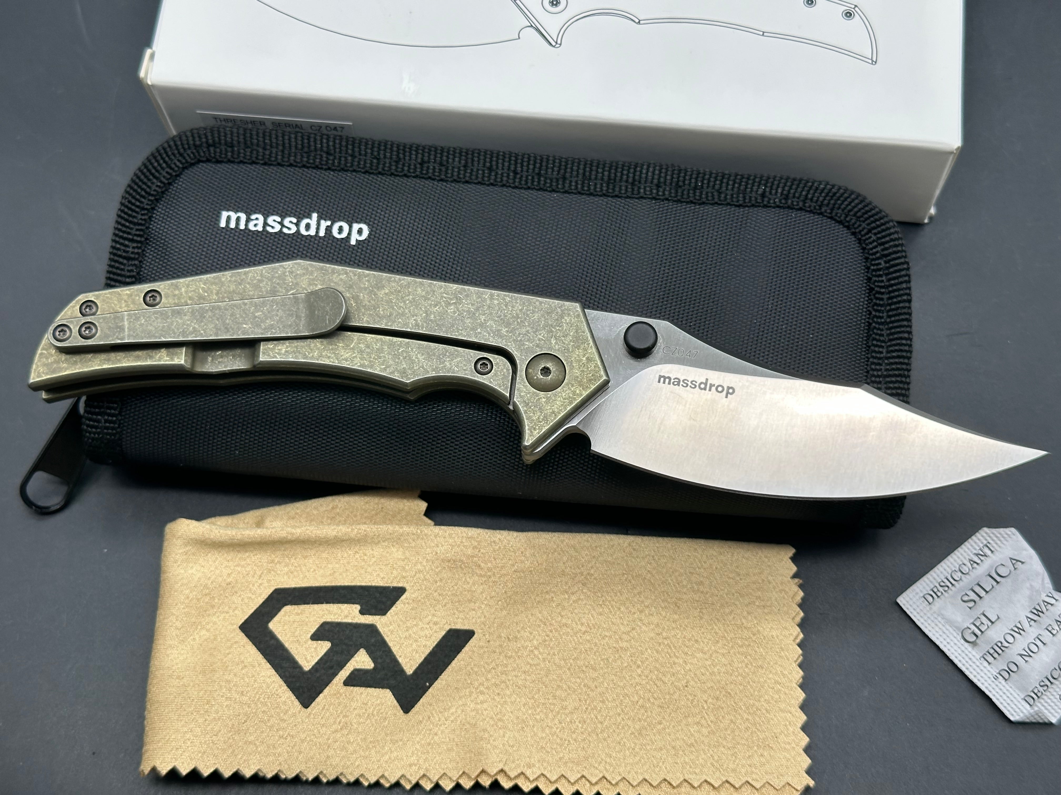 Massdrop Gavko Thresher: Gavko design. 3.5 inch satin finish, clip point CPM-S35VN blade. Tumbled and anodized copper titanium frame