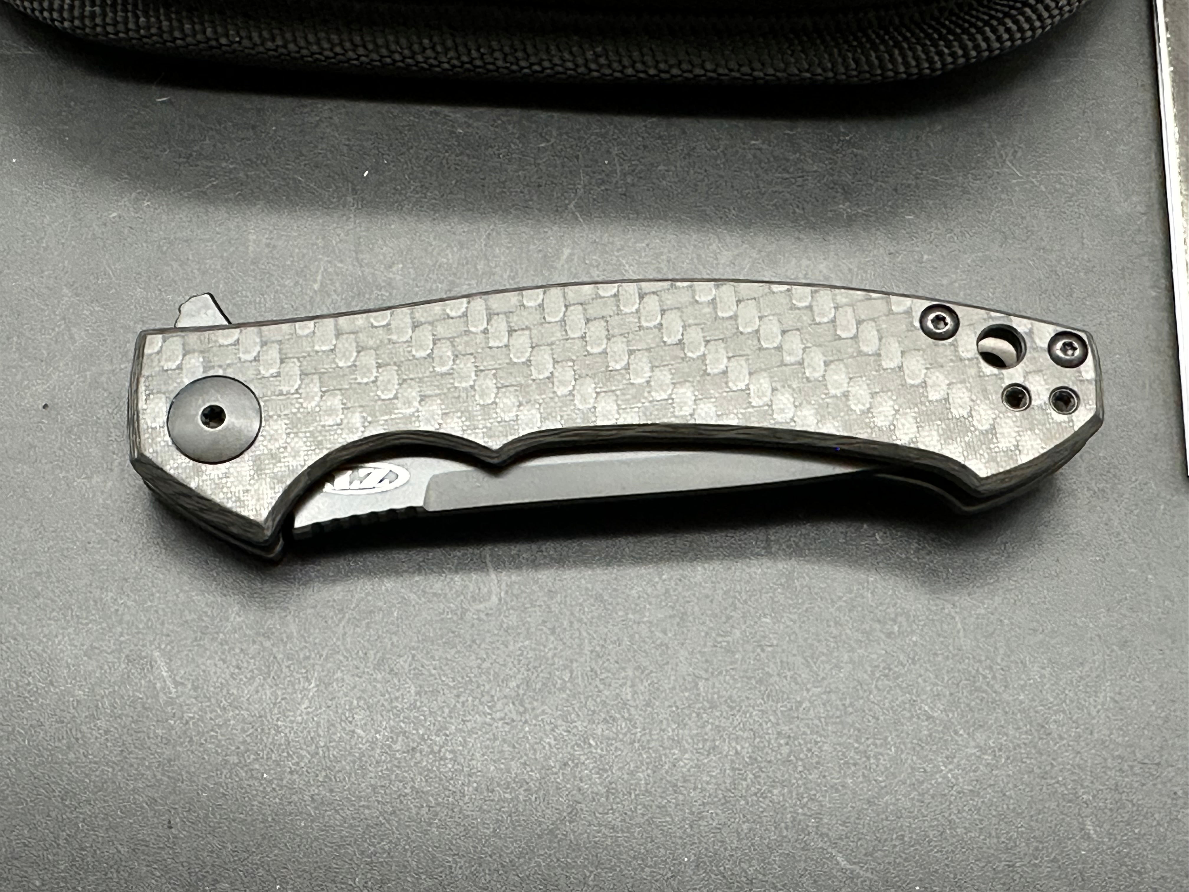 Zero Tolerance ZT 450 Sinkevich design: Dmitry Sinkevich design. 3.25 inch DLC black, stonewashed, drop point CPM-S35VN blade