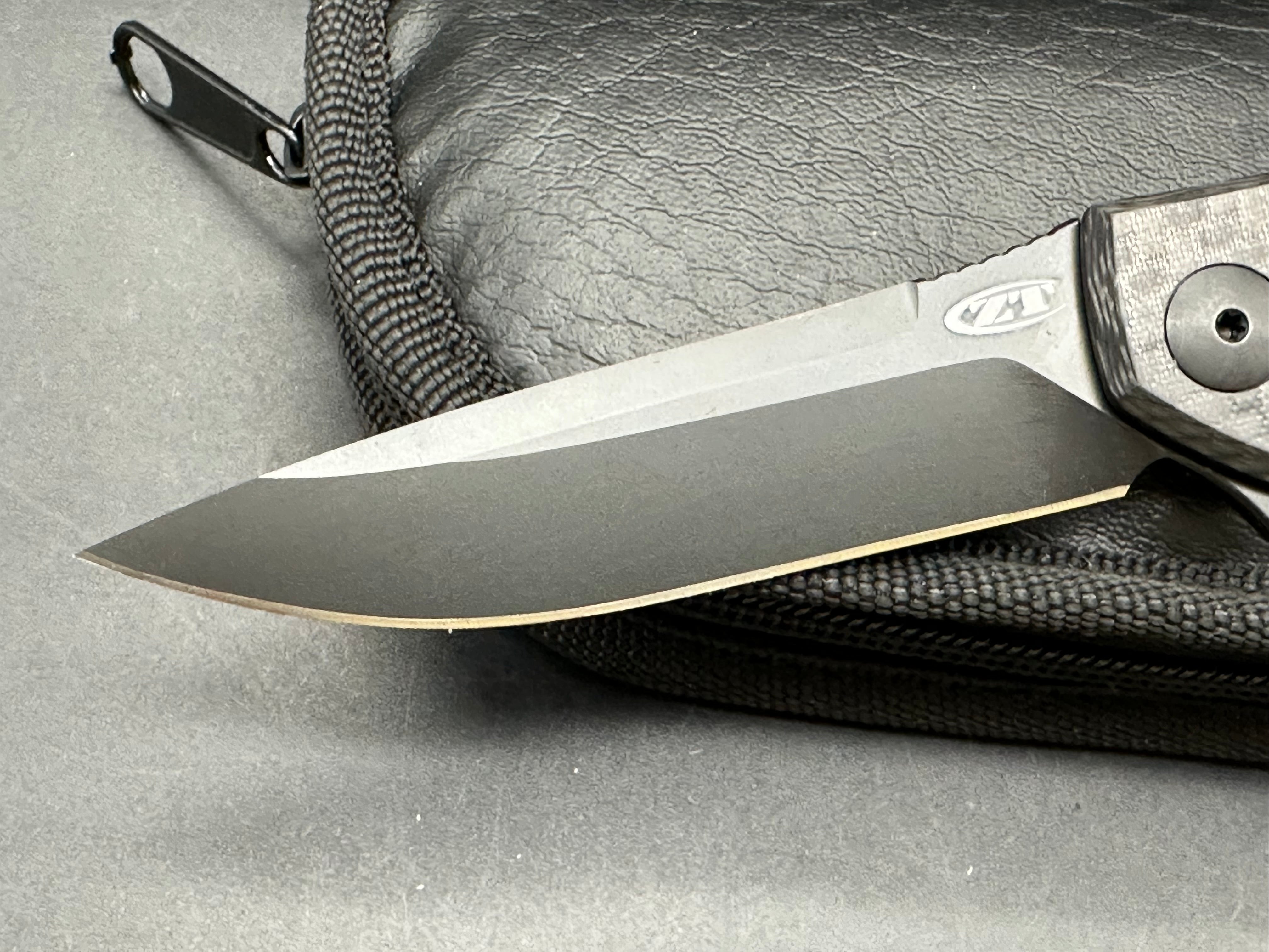 Zero Tolerance ZT 450 Sinkevich design: Dmitry Sinkevich design. 3.25 inch DLC black, stonewashed, drop point CPM-S35VN blade