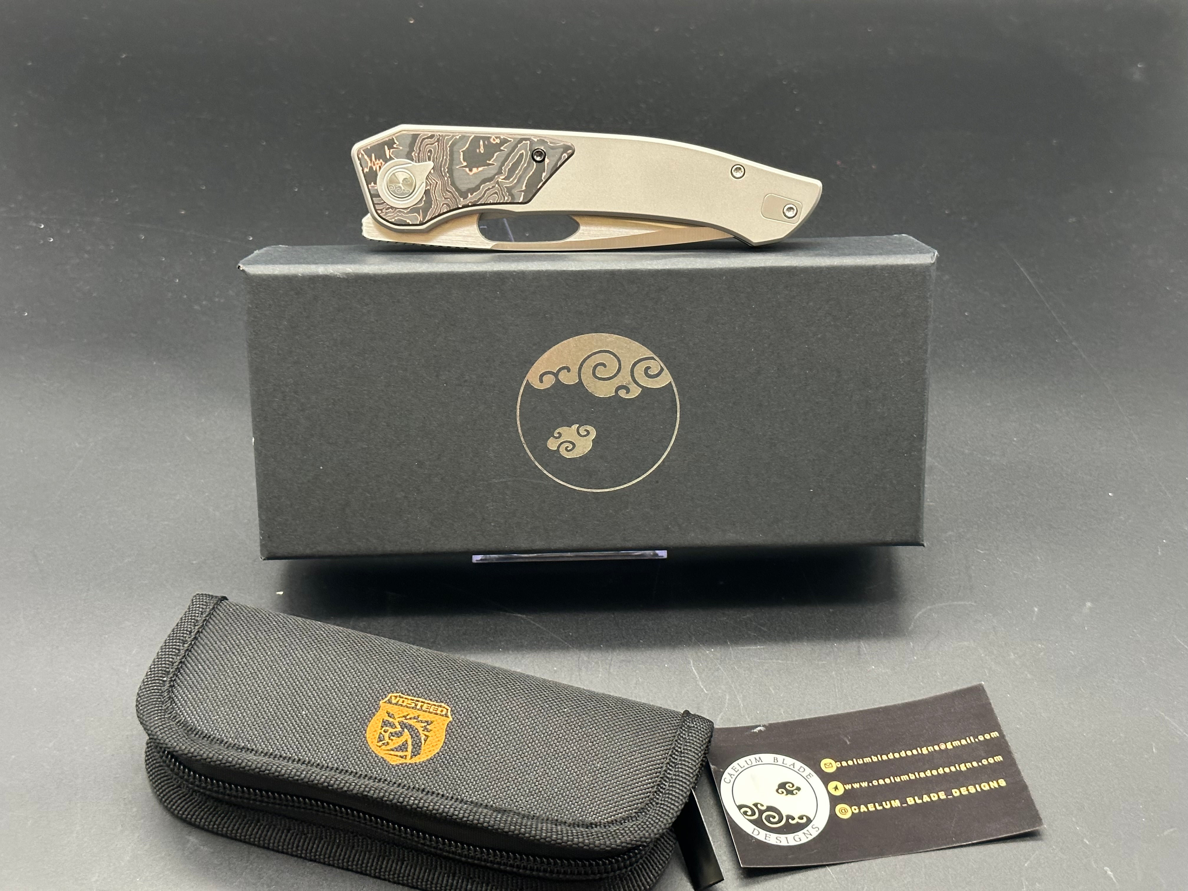 Caelum Blade Designs “Ari” copper/CF scales w/S90V blade