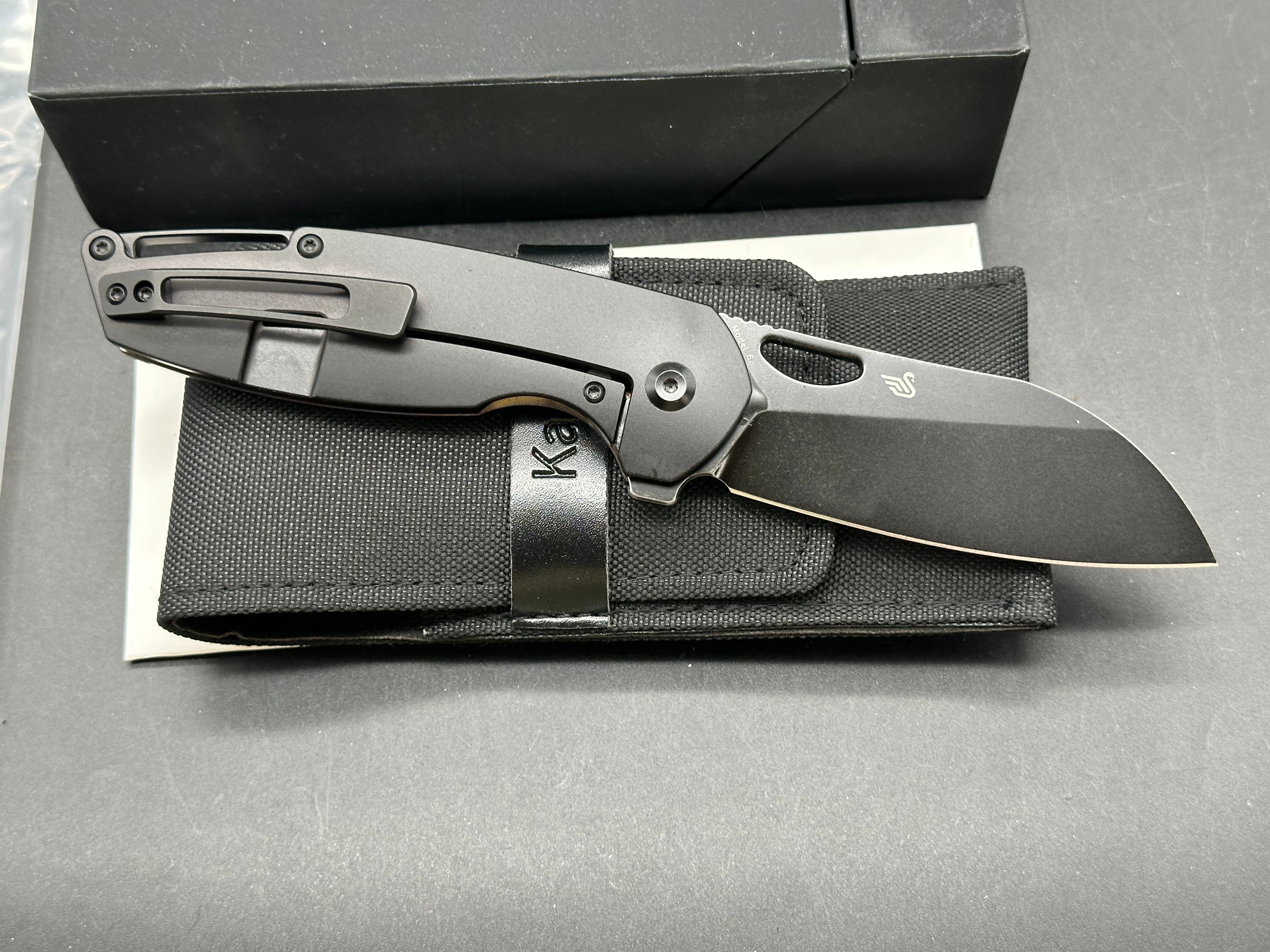 Kansept Model 6: Nick Swan design. 3.1 inch stonewashed, flat grind, black anodized CPM-S35VN sheepsfoot blade