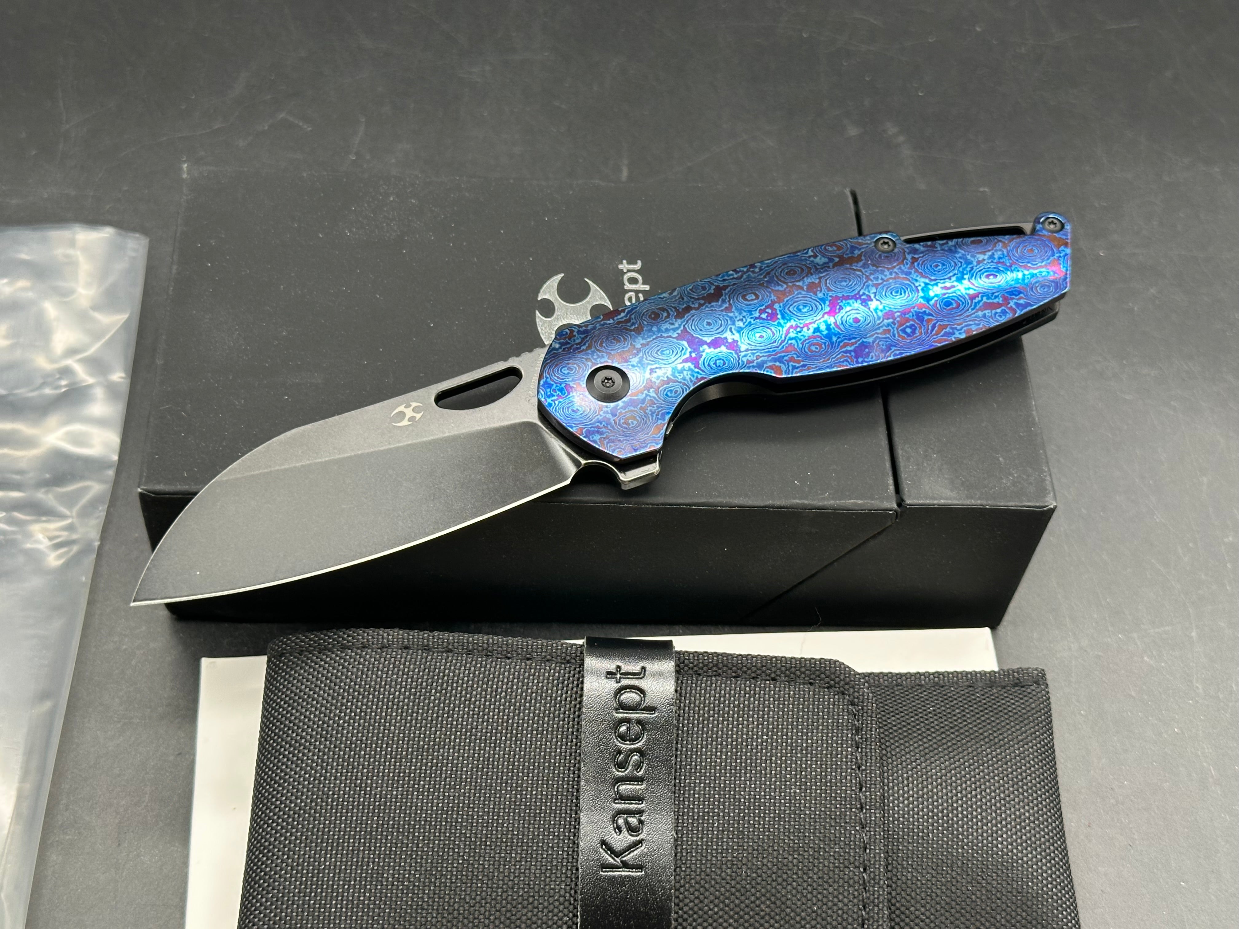 Kansept Model 6: Nick Swan design. 3.1 inch stonewashed, flat grind, black anodized CPM-S35VN sheepsfoot blade