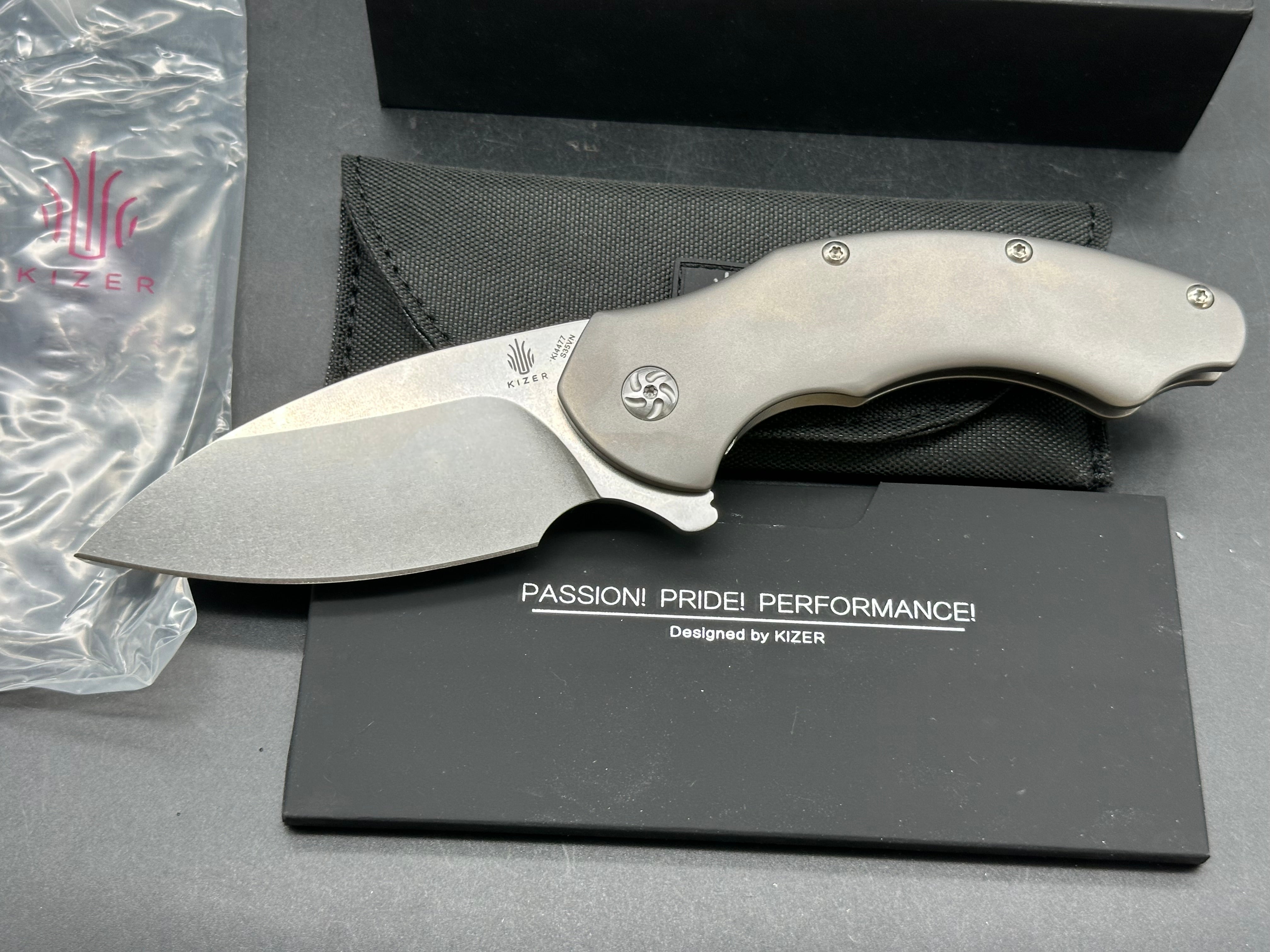 Kizer Roach Matt Degnan design 3.5 inch drop point flat grind, satin CPM-S35VN blade Titanium scales and clip with Roach insignia