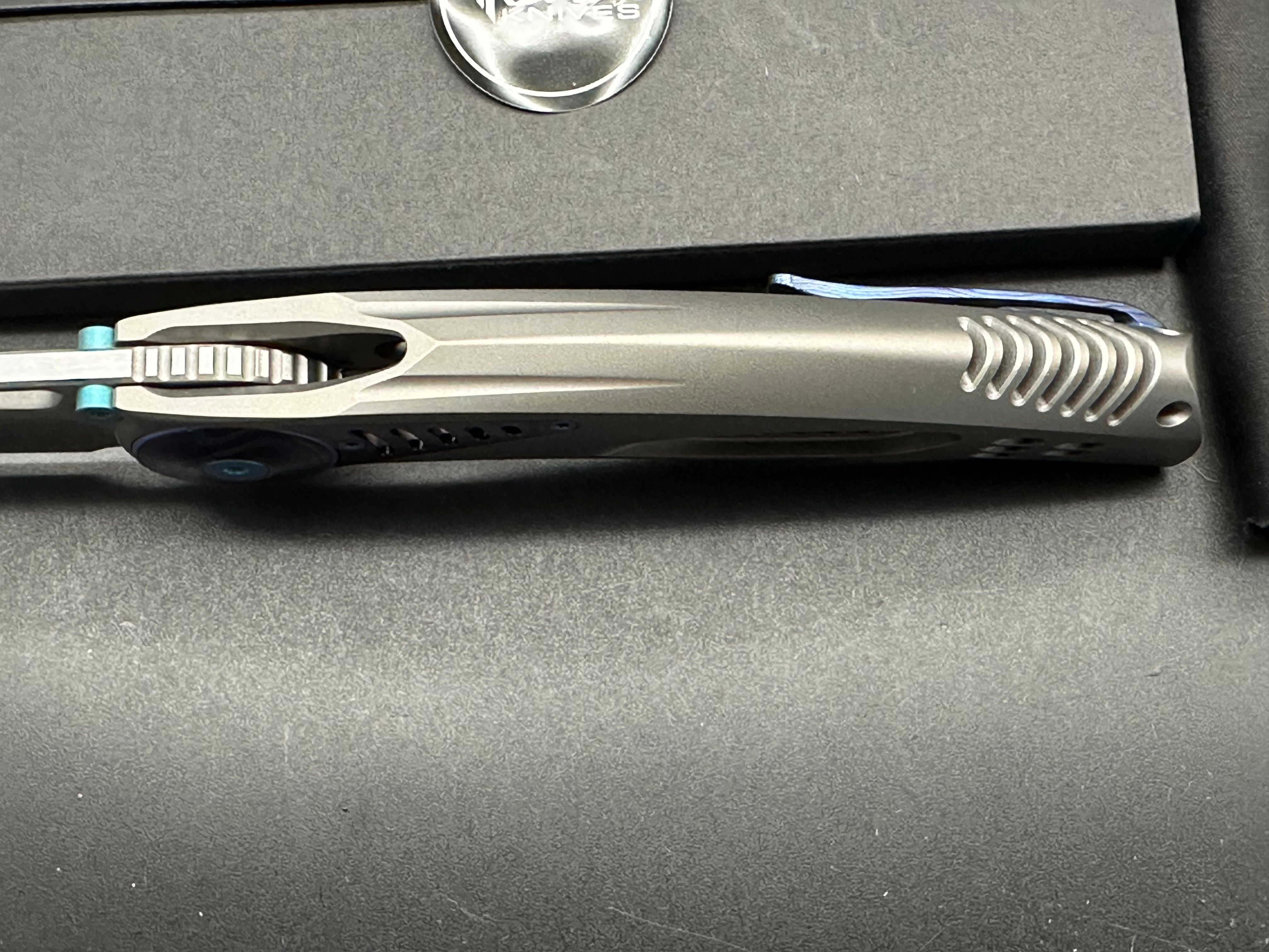 Reate Knives + Alvin Lee - GTR/Grey Milled Integral Ti Handle w/ Zircoti Inlays & Blue Ano Accents