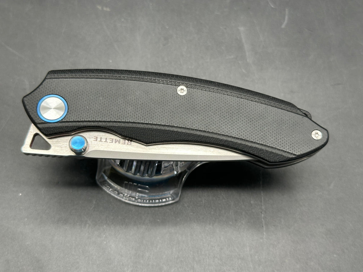 Remette Wild Species black G10 handle w/14c28n blade