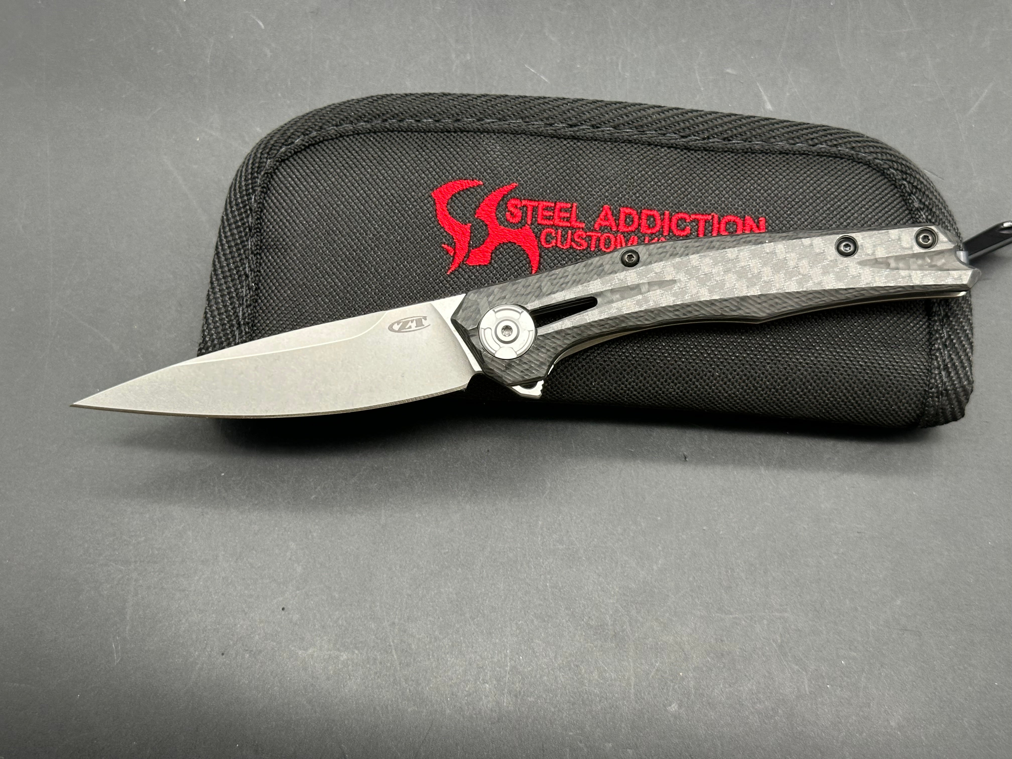 Zero Tolerance ZT 0707: 3.625 inch tumbled, drop point CPM-20CV blade. Titanium handle
