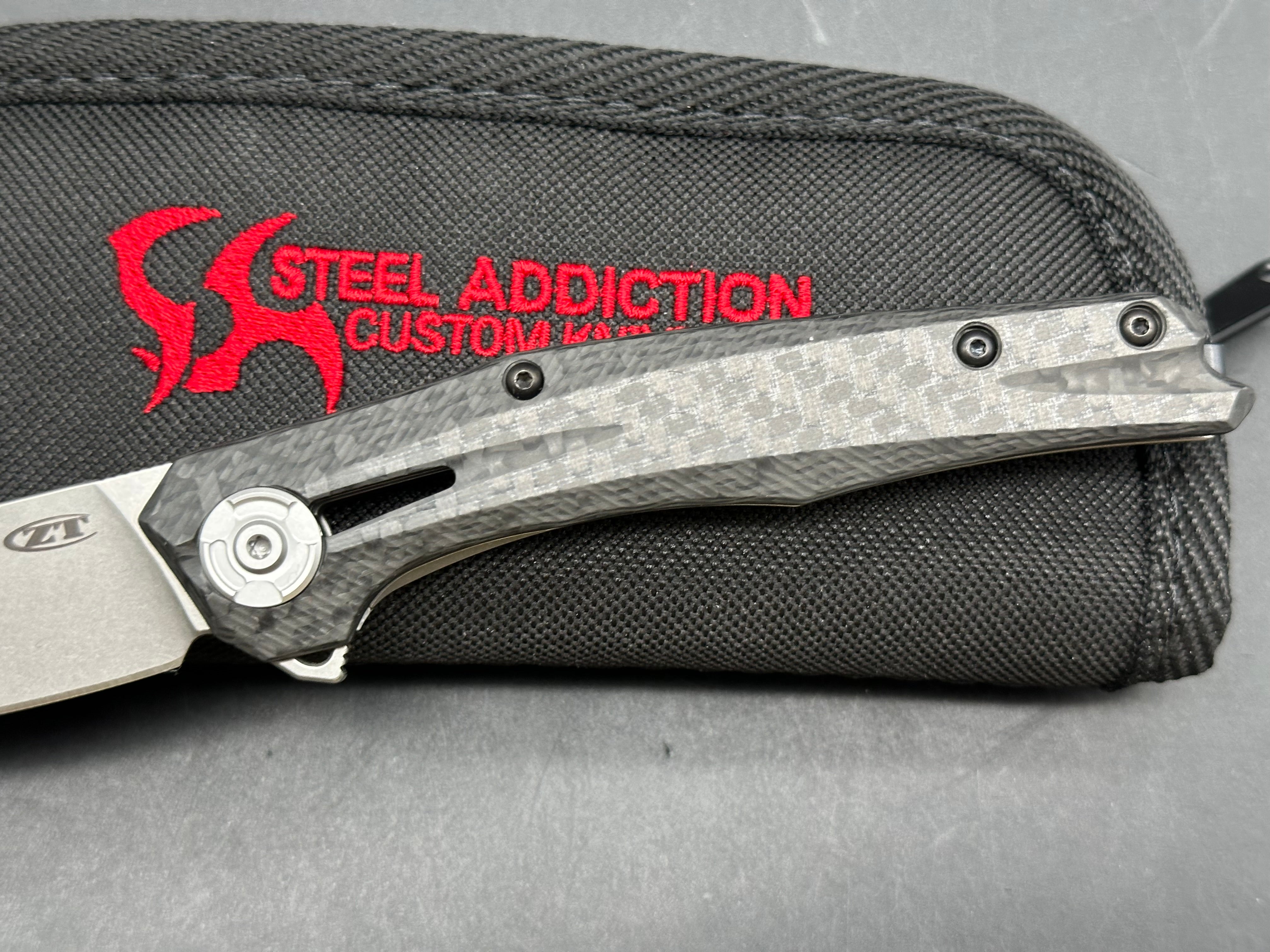 Zero Tolerance ZT 0707: 3.625 inch tumbled, drop point CPM-20CV blade. Titanium handle