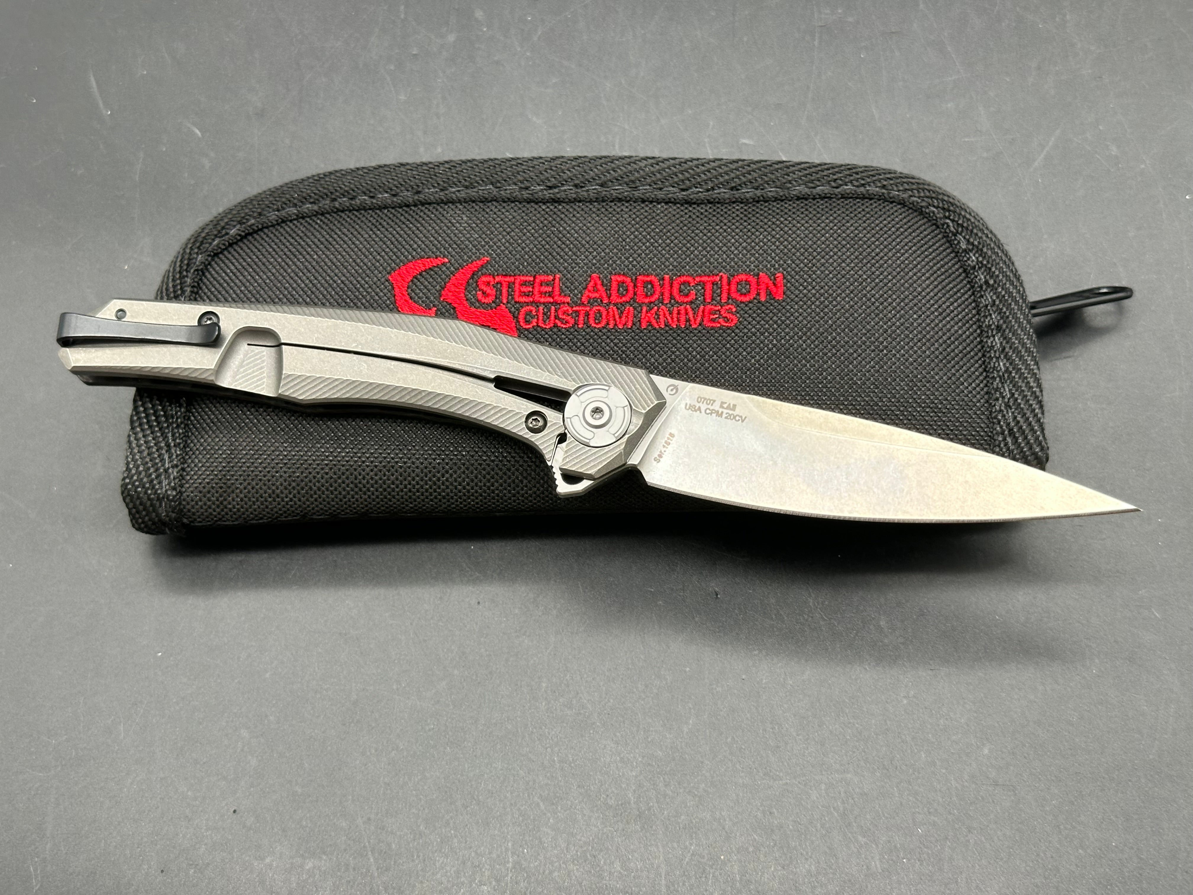 Zero Tolerance ZT 0707: 3.625 inch tumbled, drop point CPM-20CV blade. Titanium handle