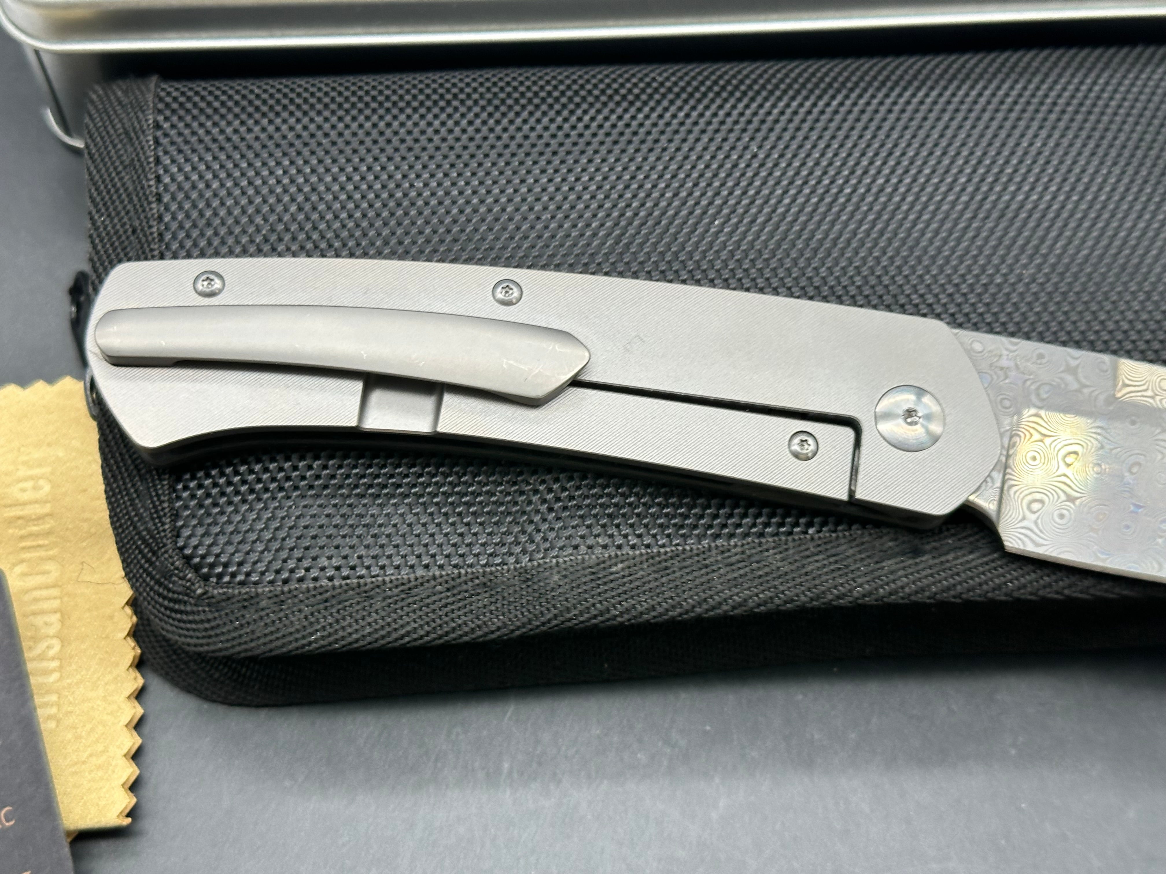 Artisan Cutlery Centauri: 3.5 inch Damascus blade. Front flipper. Carbon fiber front scale