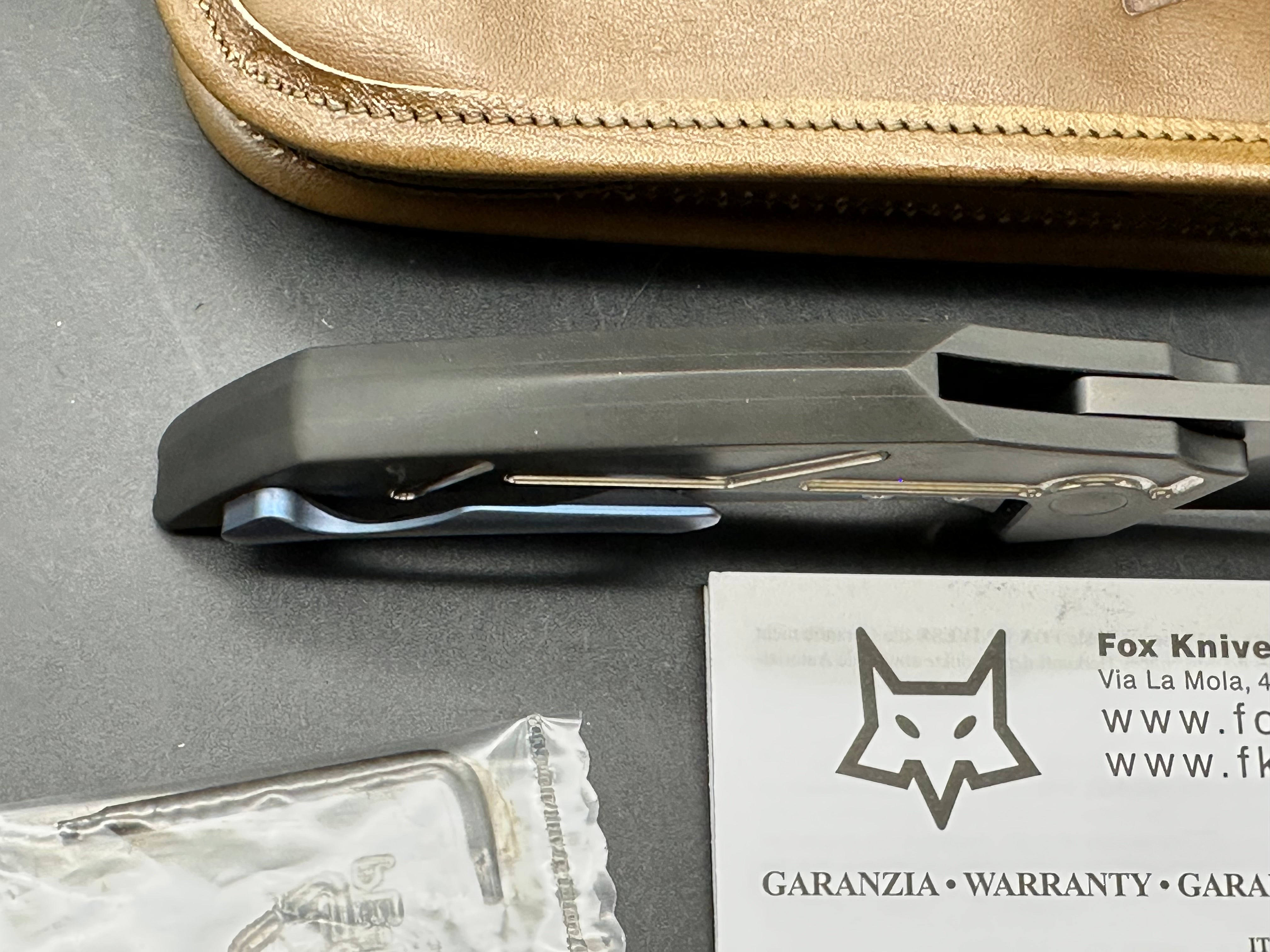 Fox Knives Phoenix: Tashi Bharucha design. Made in Italy. 3.54 inch Bohler M390 blade. Machined titanium handle