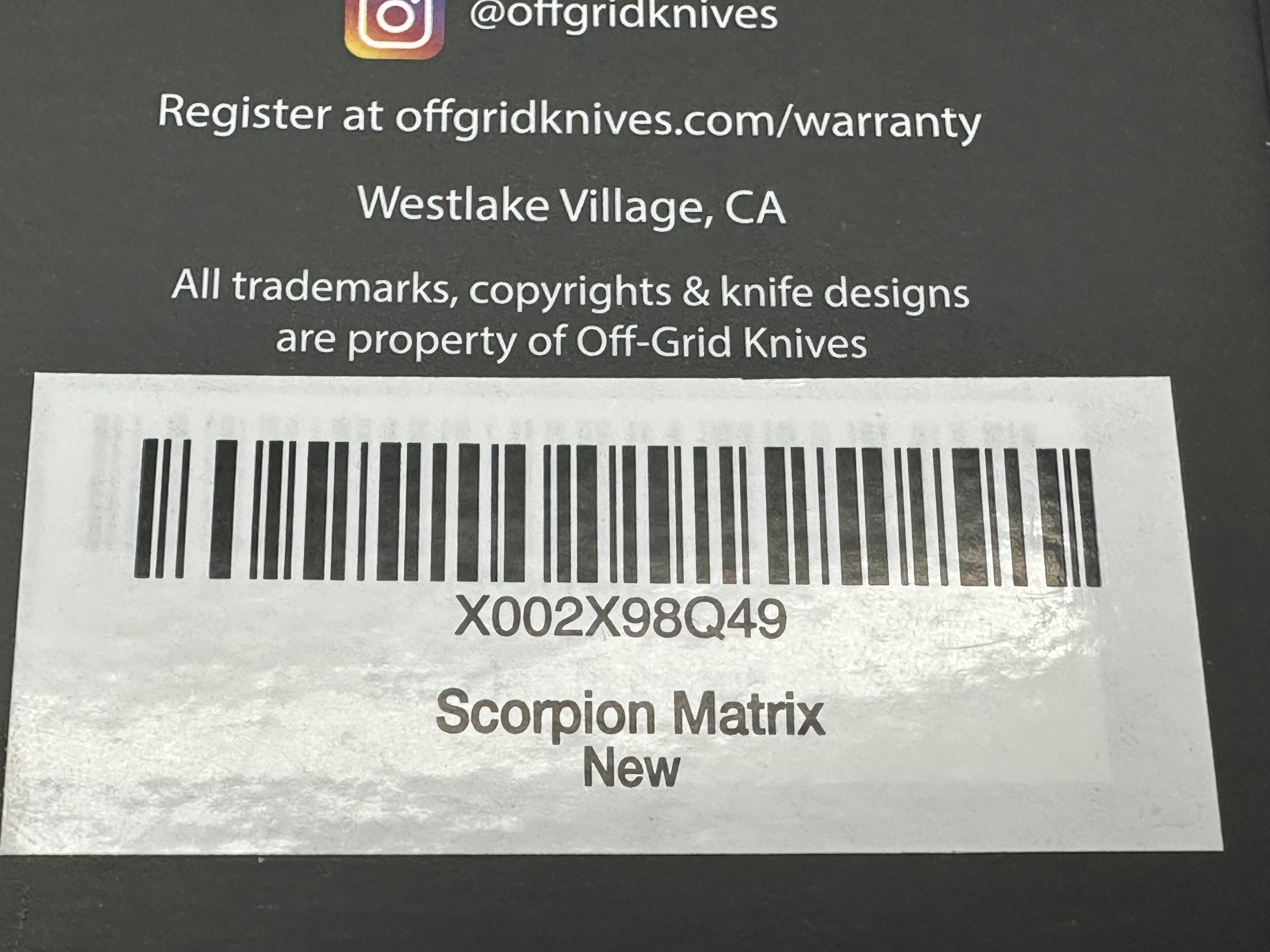 Off Grid Knives Elite Scorpion Matrix titanium w/carbon fiber copper inlay