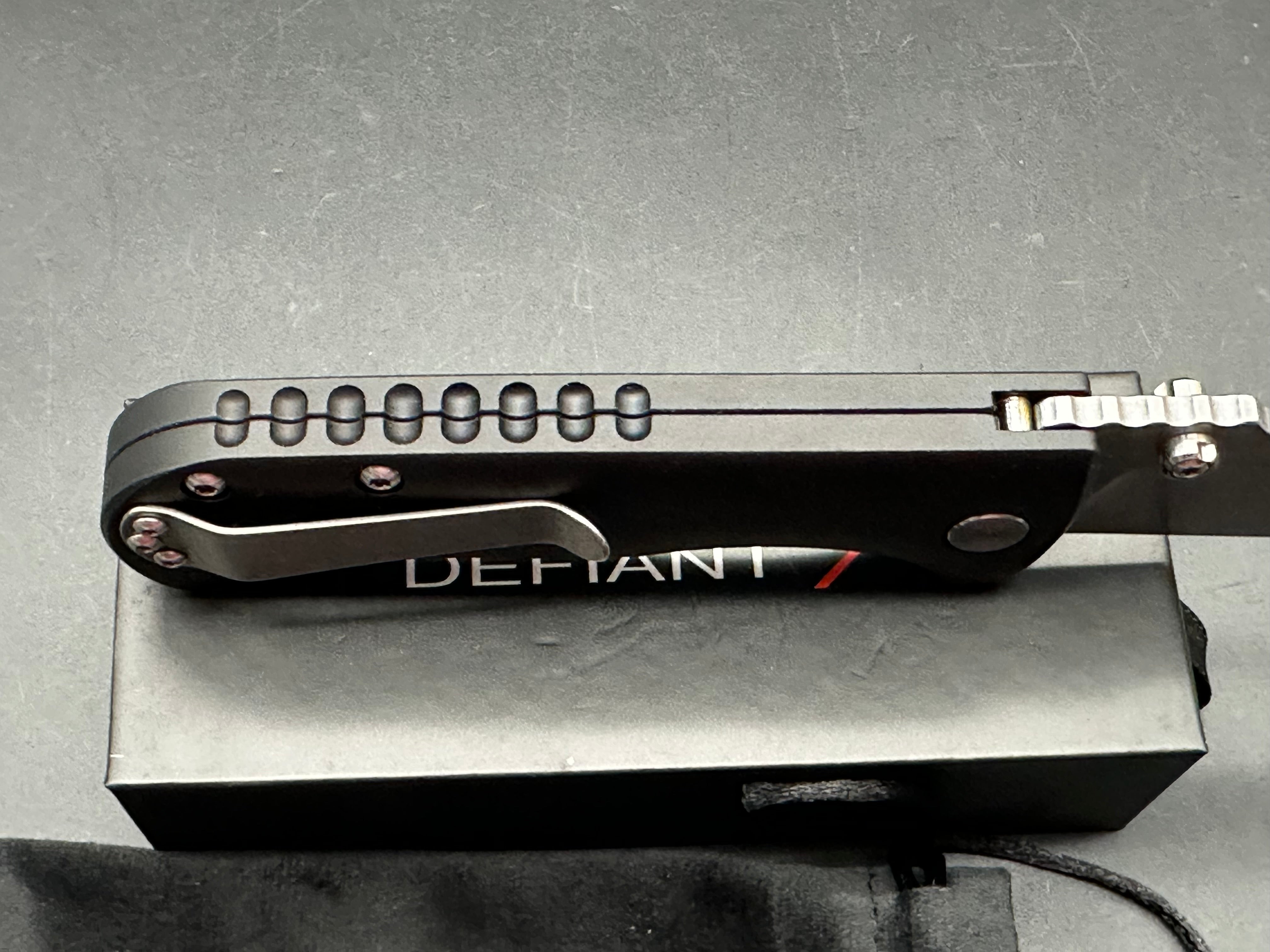 Defiant-7 Talos Button Lock with Magnacut Blade and Black Hardcoat Anodized Aluminum Handles