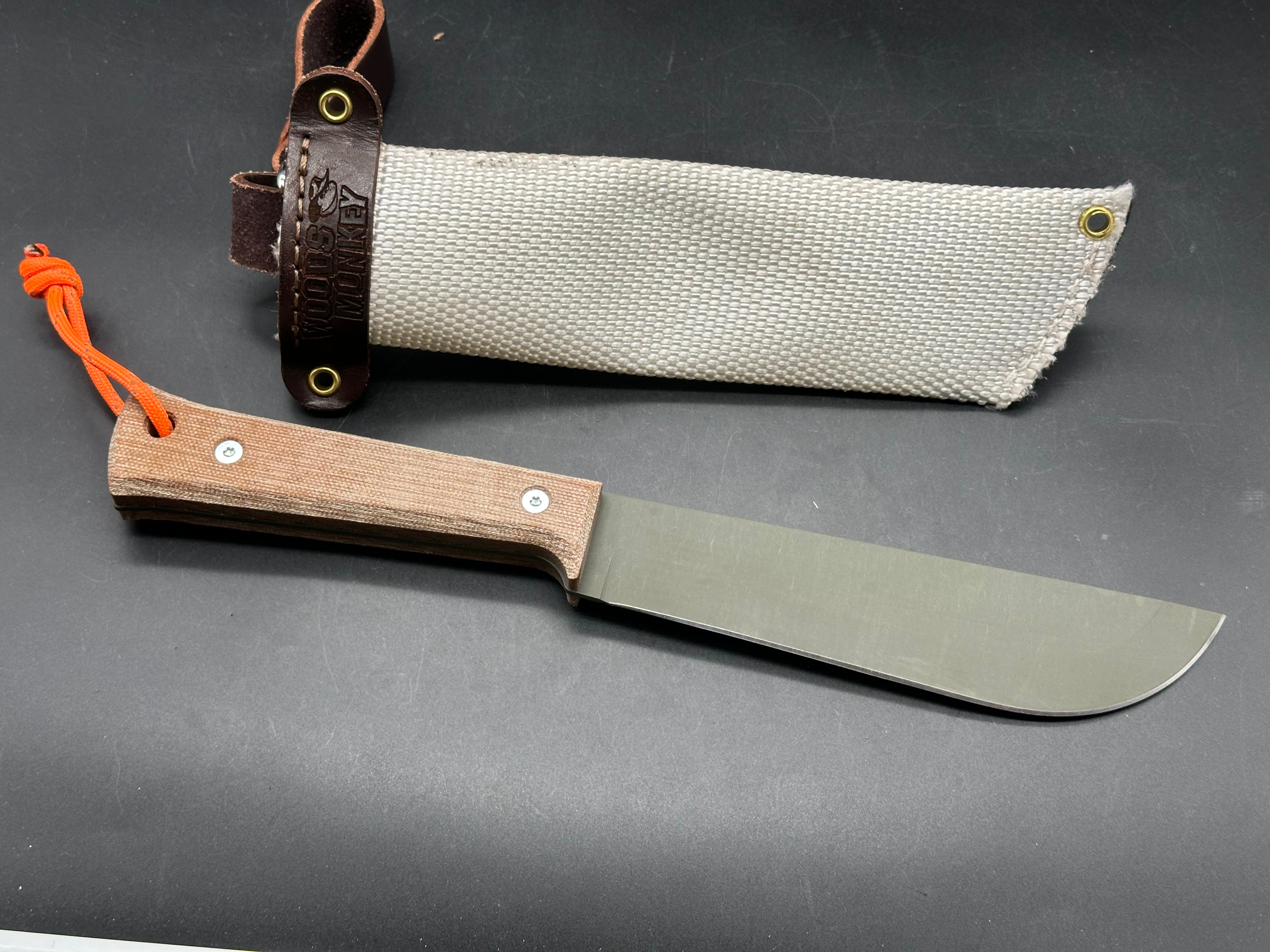 Woods Monkey Half Chete 1095 steel with OD green cerakote and natural canvas micarta handles