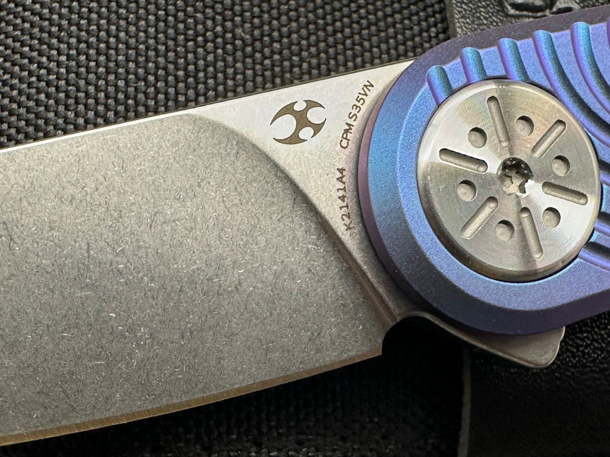 KANSEPT SYMÉTRIX BLUE-PURPLE ANODIZED TITANIUM/SWIRL PATTERN HANDLE 2.85" STONEWASH S35VN