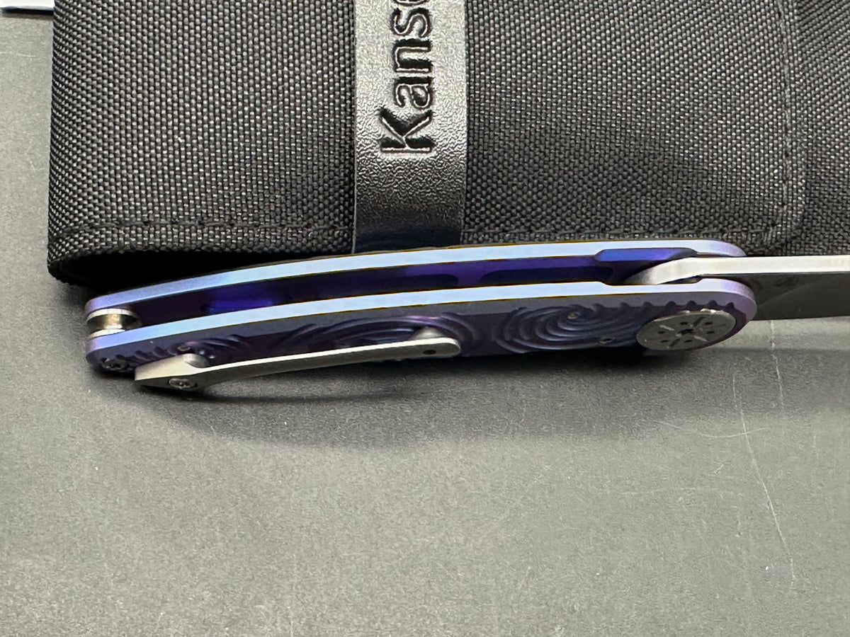 KANSEPT SYMÉTRIX BLUE-PURPLE ANODIZED TITANIUM/SWIRL PATTERN HANDLE 2.85" STONEWASH S35VN