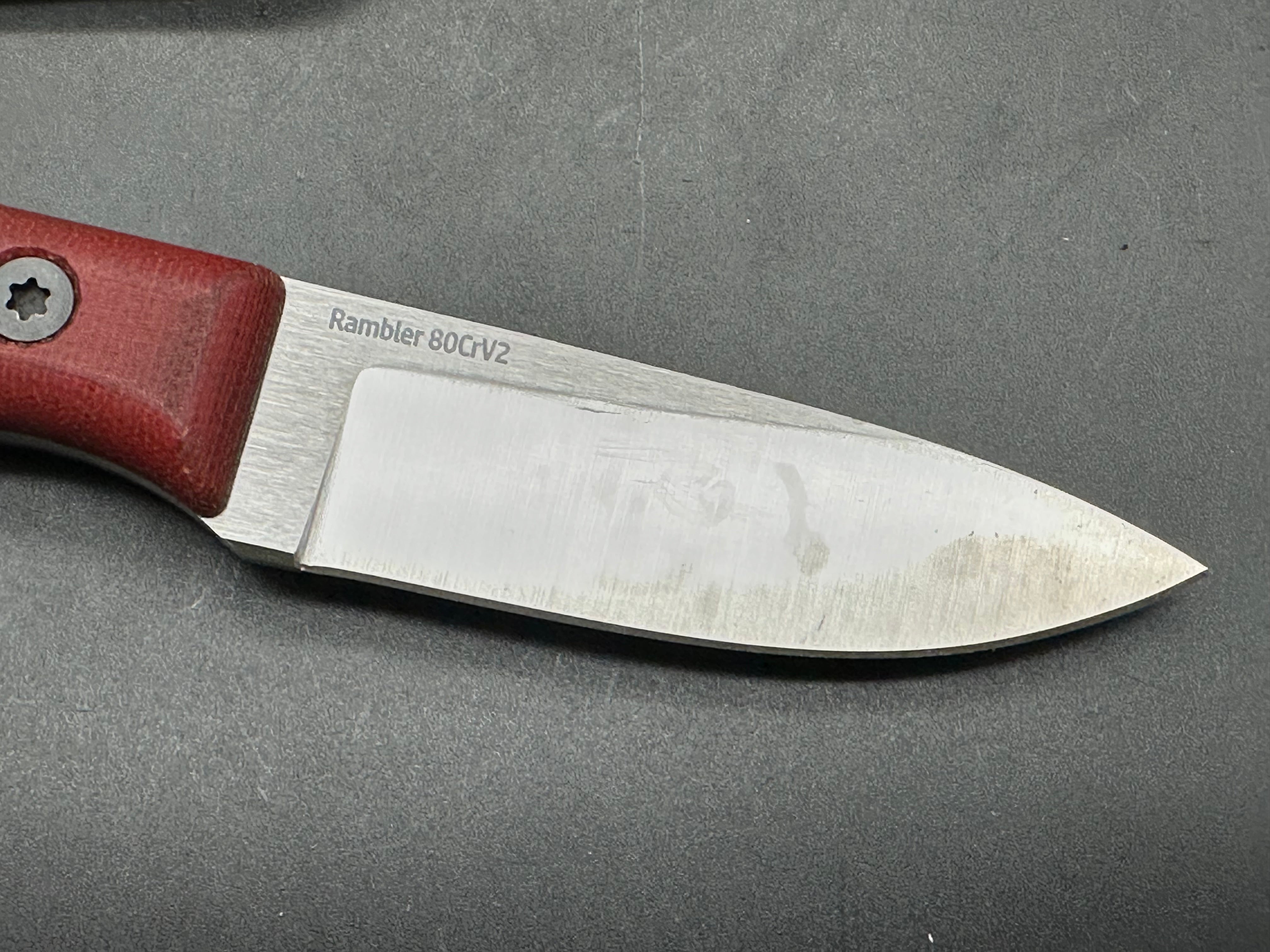 Very Good Knife Company - Rambler in 80CRV2 with red canvas micarta handles, saber grind