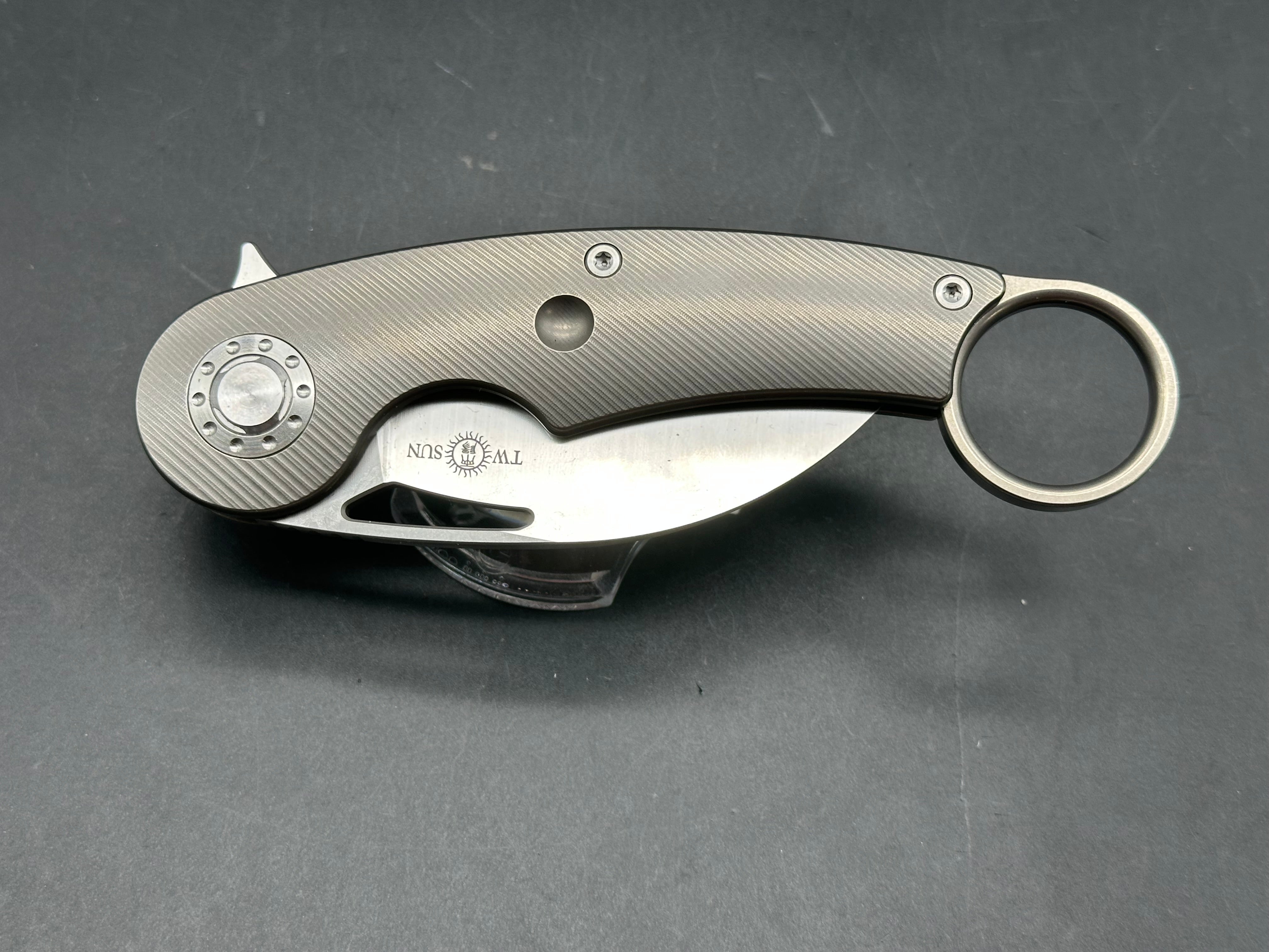 TwoSun 172 Karambit: Nightmorning Tepe design. 3 inch S90V blade. Titanium clip with ceramic ball bearing