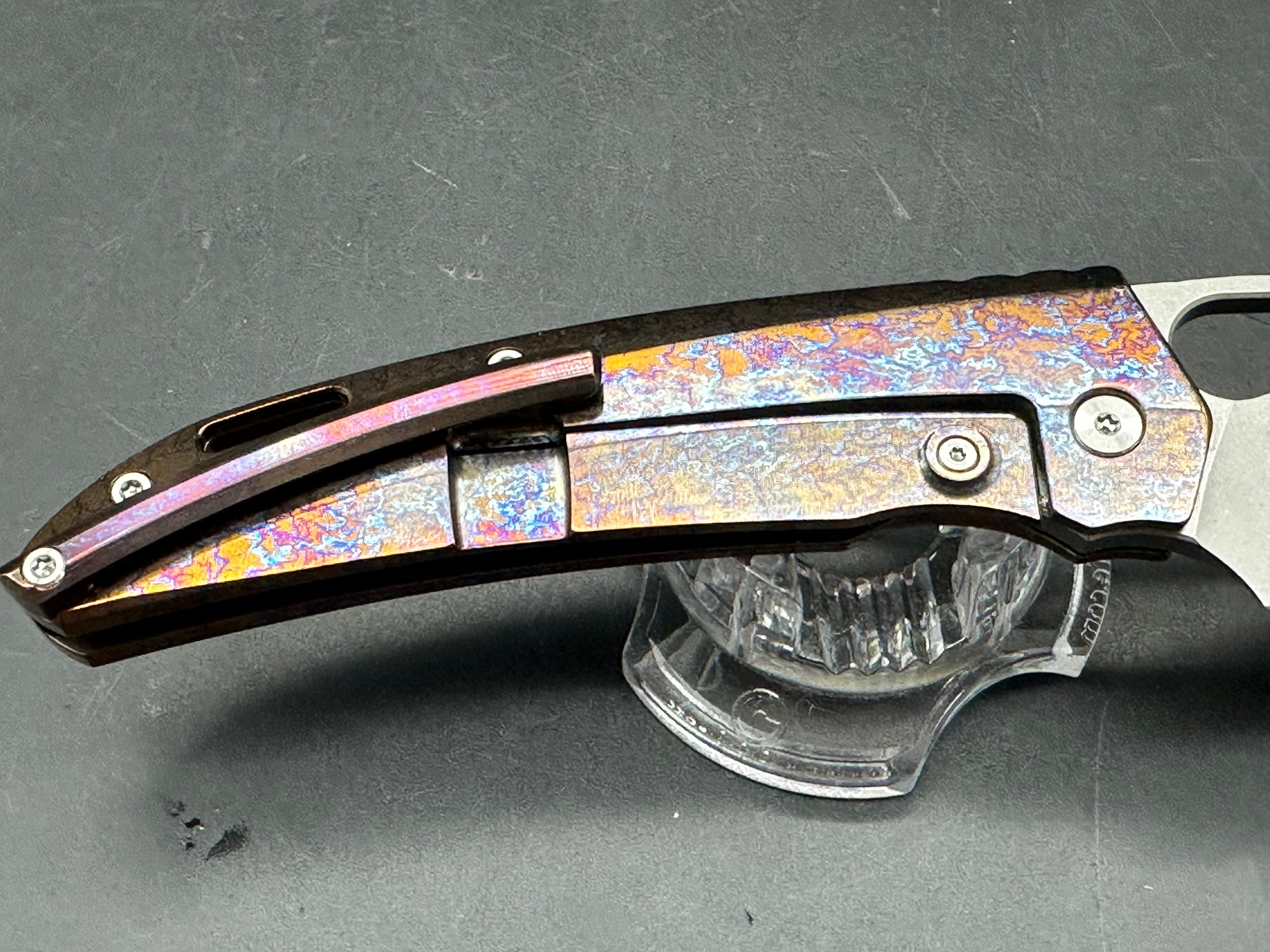 TwoSun TS376 3.66 satin finished D2 blade. Flamed titanium scales and backspacer