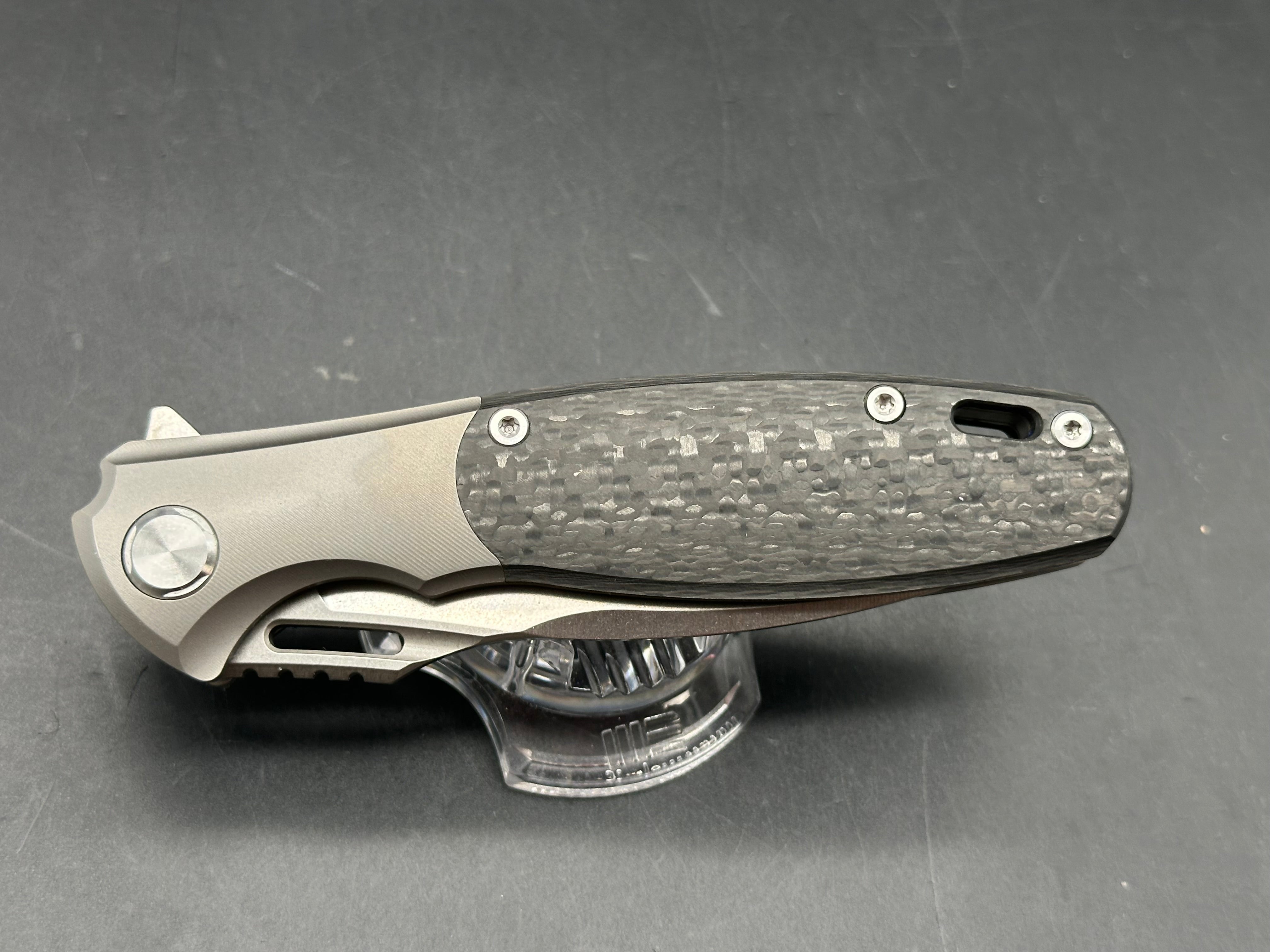 TwoSun TS162 Wong design. 3.66 inch CPM-S90V blade. Frame lock. Titanium and carbon fiber scales
