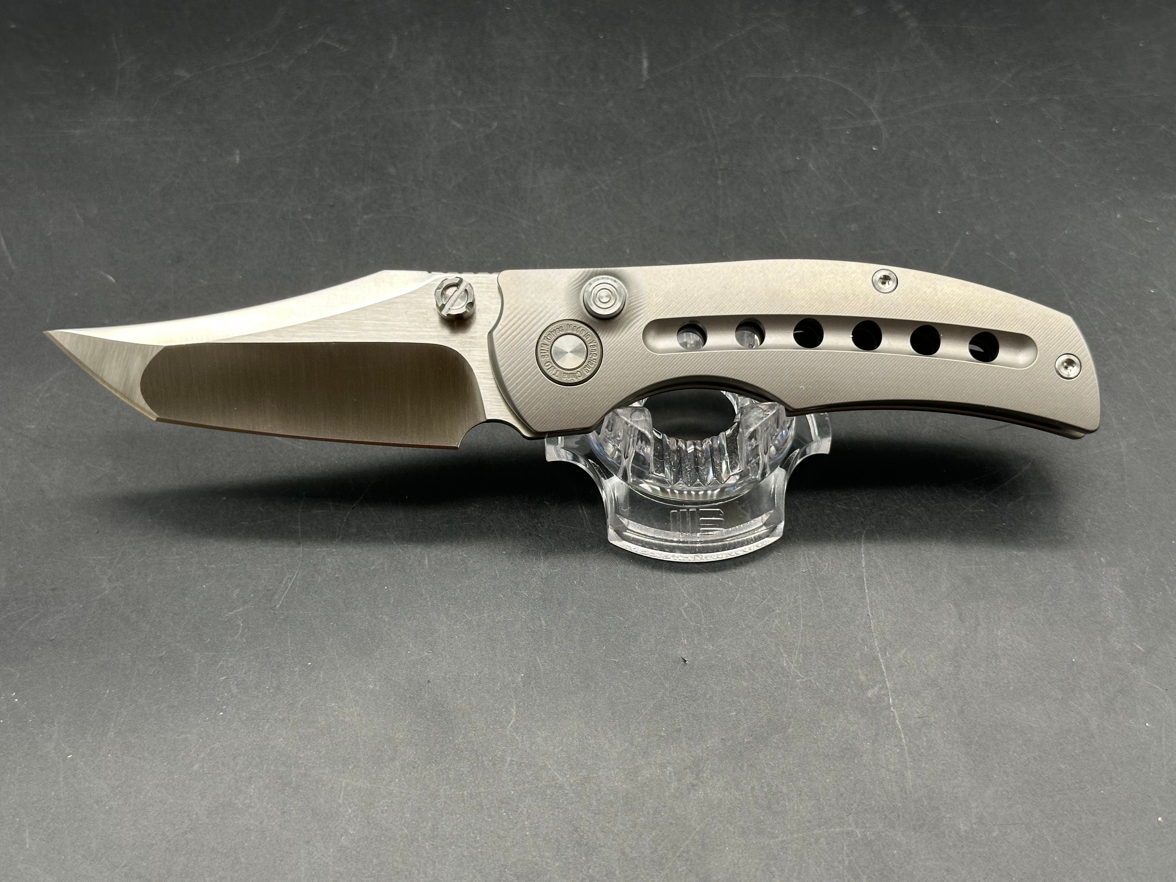 TwoSun TS313 / 3.375 inch Bohler M390 blade. Titanium handle. Button lock