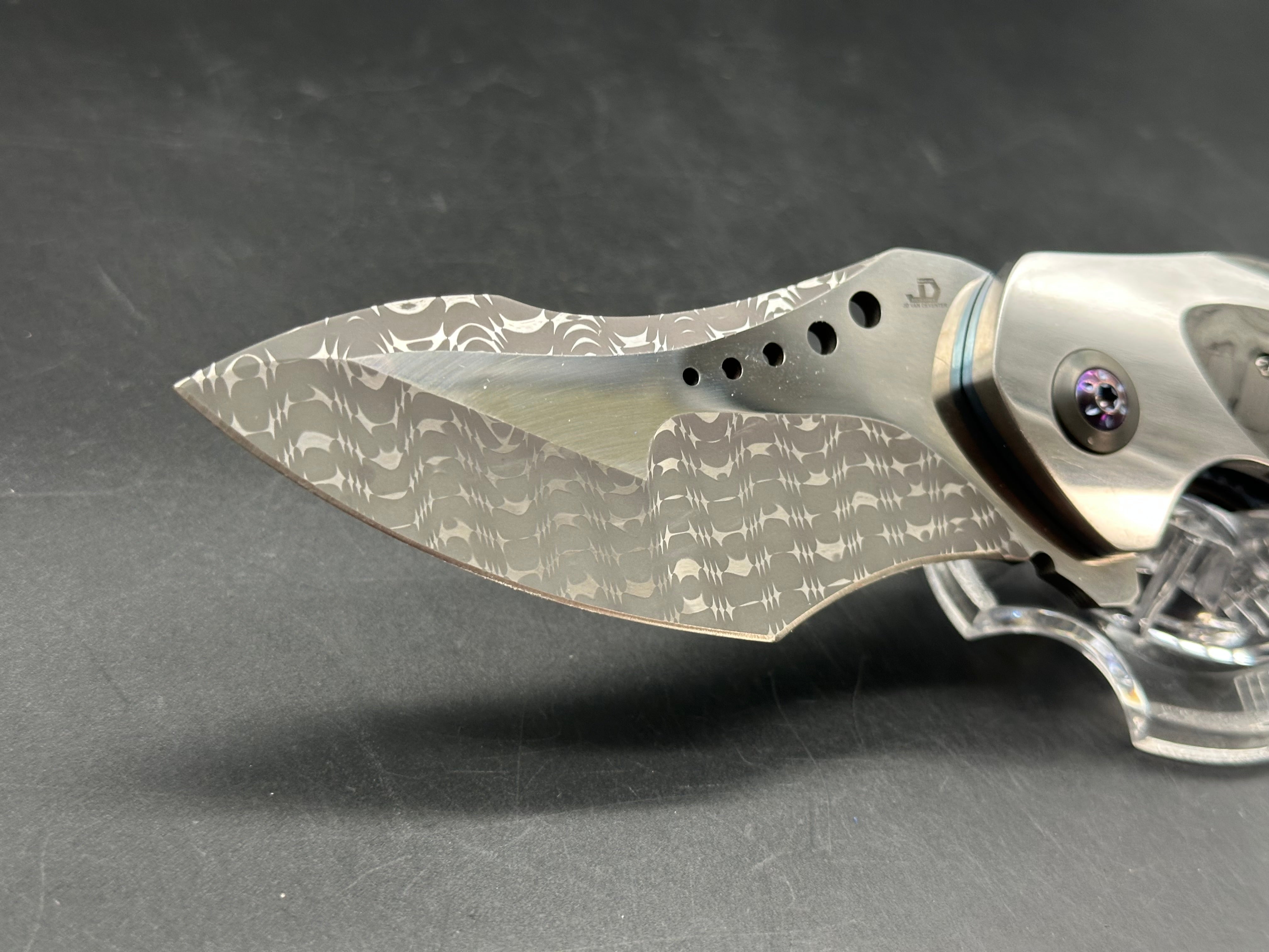JD Vandeventer Sympatico: 3.75 inch Damascus blade with mirror polished flats. Handle with mirror polished titanium scales