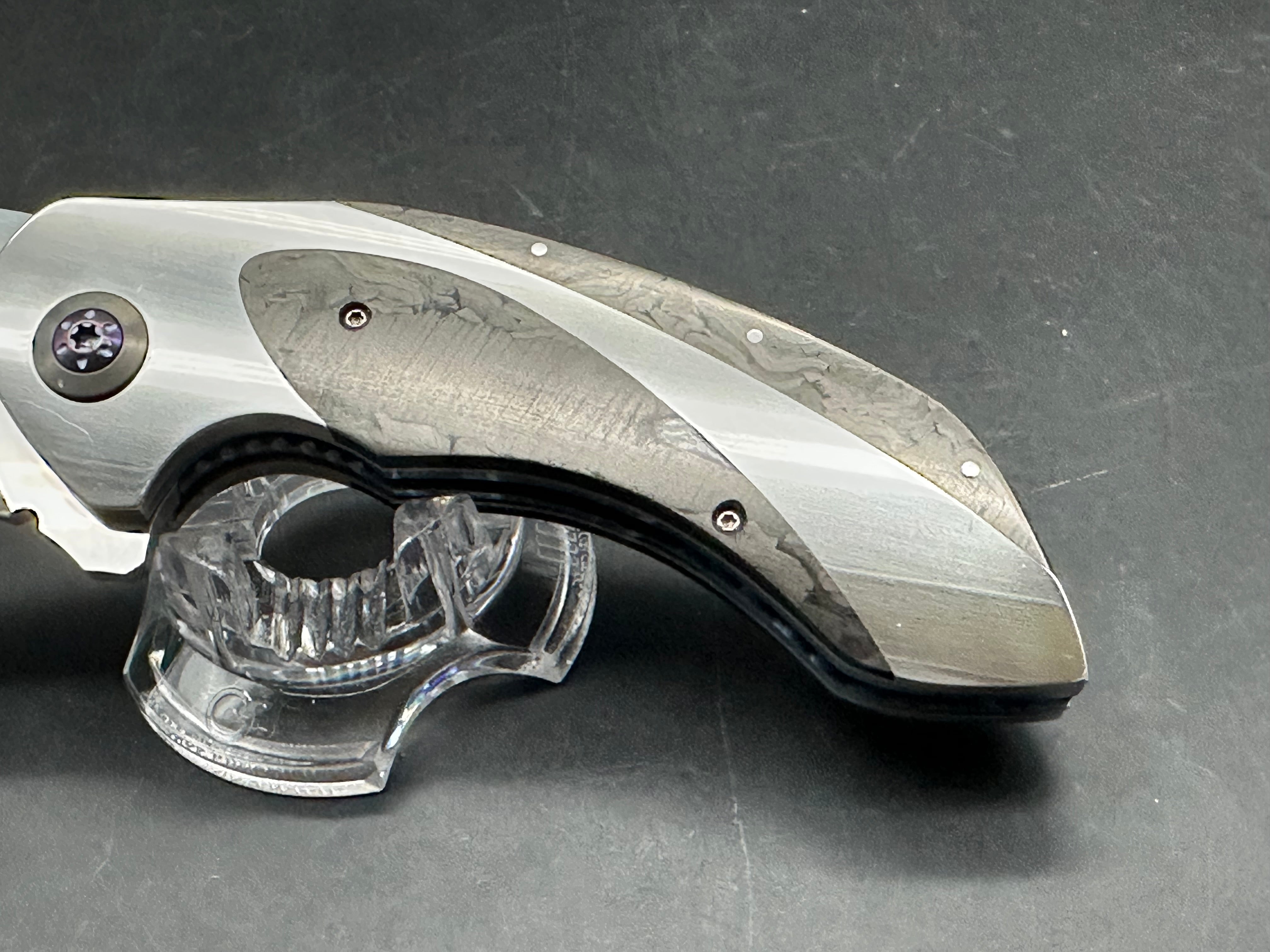 JD Vandeventer Sympatico: 3.75 inch Damascus blade with mirror polished flats. Handle with mirror polished titanium scales