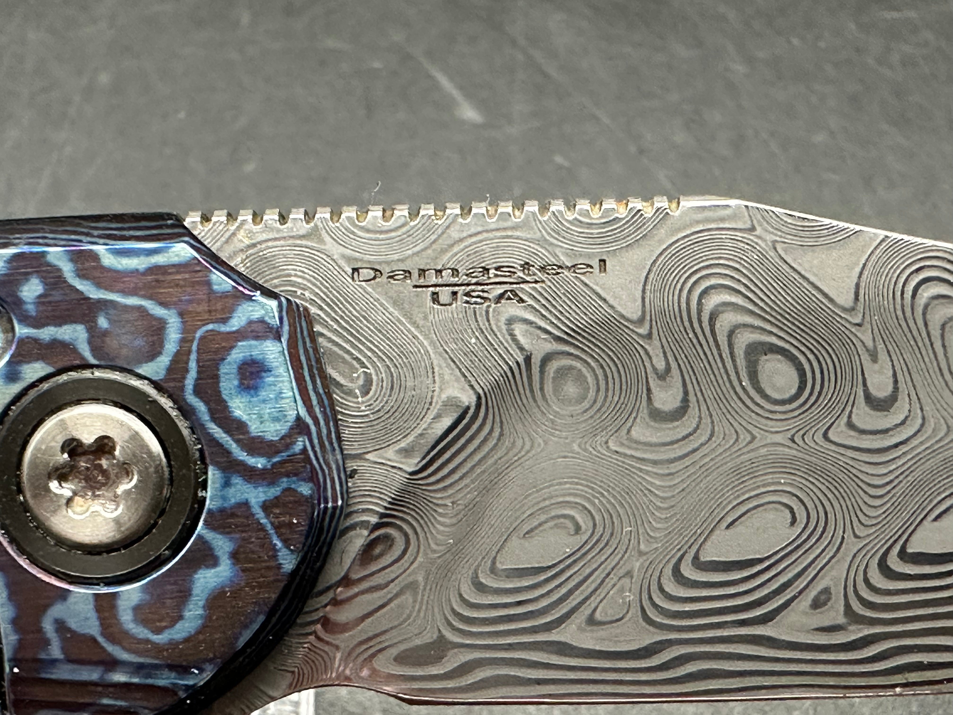 Brad Southard Mini Tolk Full Dress: 3.25 inch USA Damasteel blade. Mokuti scales with matching Mokuti backspacer and clip