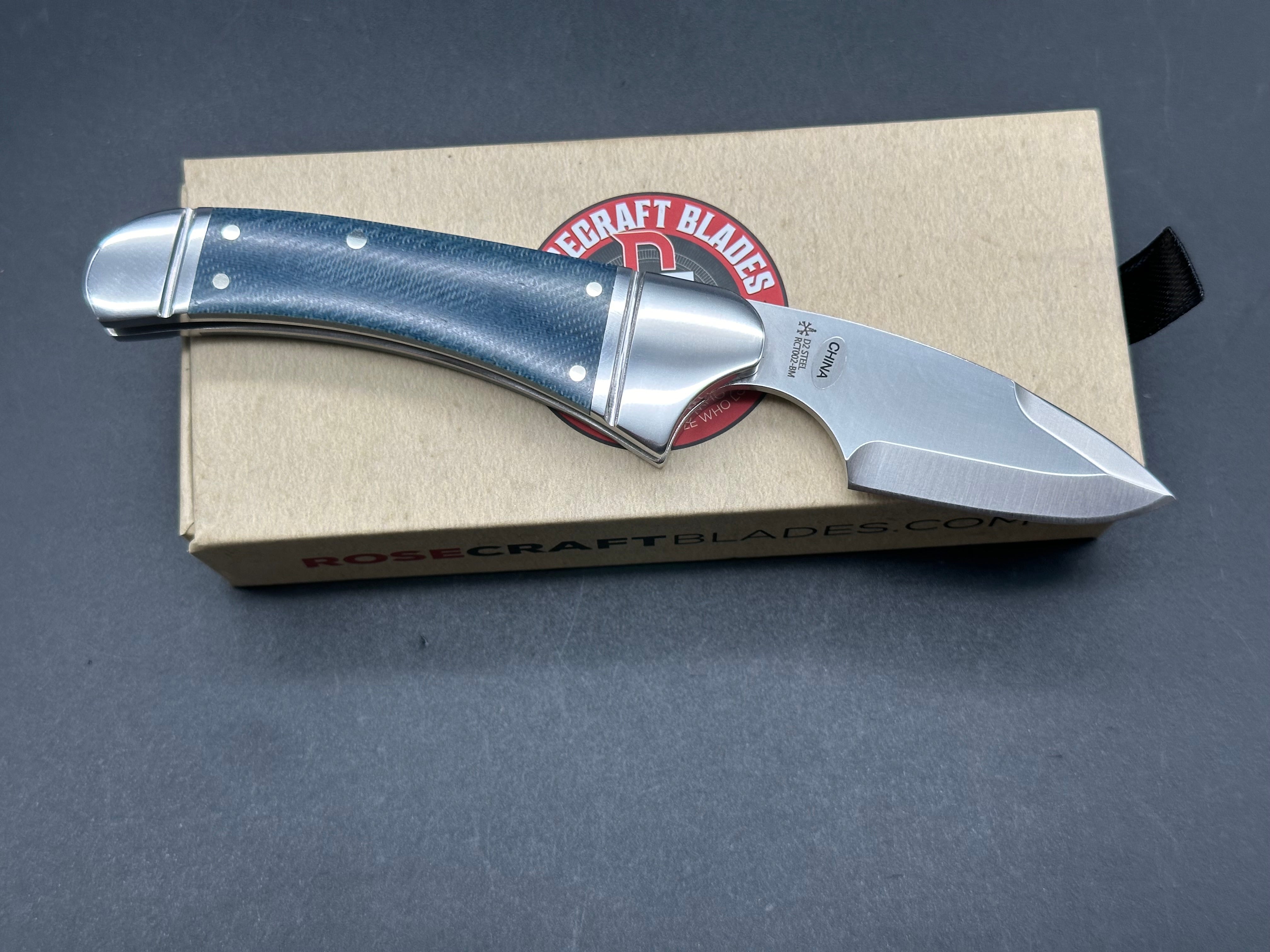 Rose Craft Zambezi, 2.5” D2 Satin Spear Point Blade, Blue Micarta and Steel Handle.