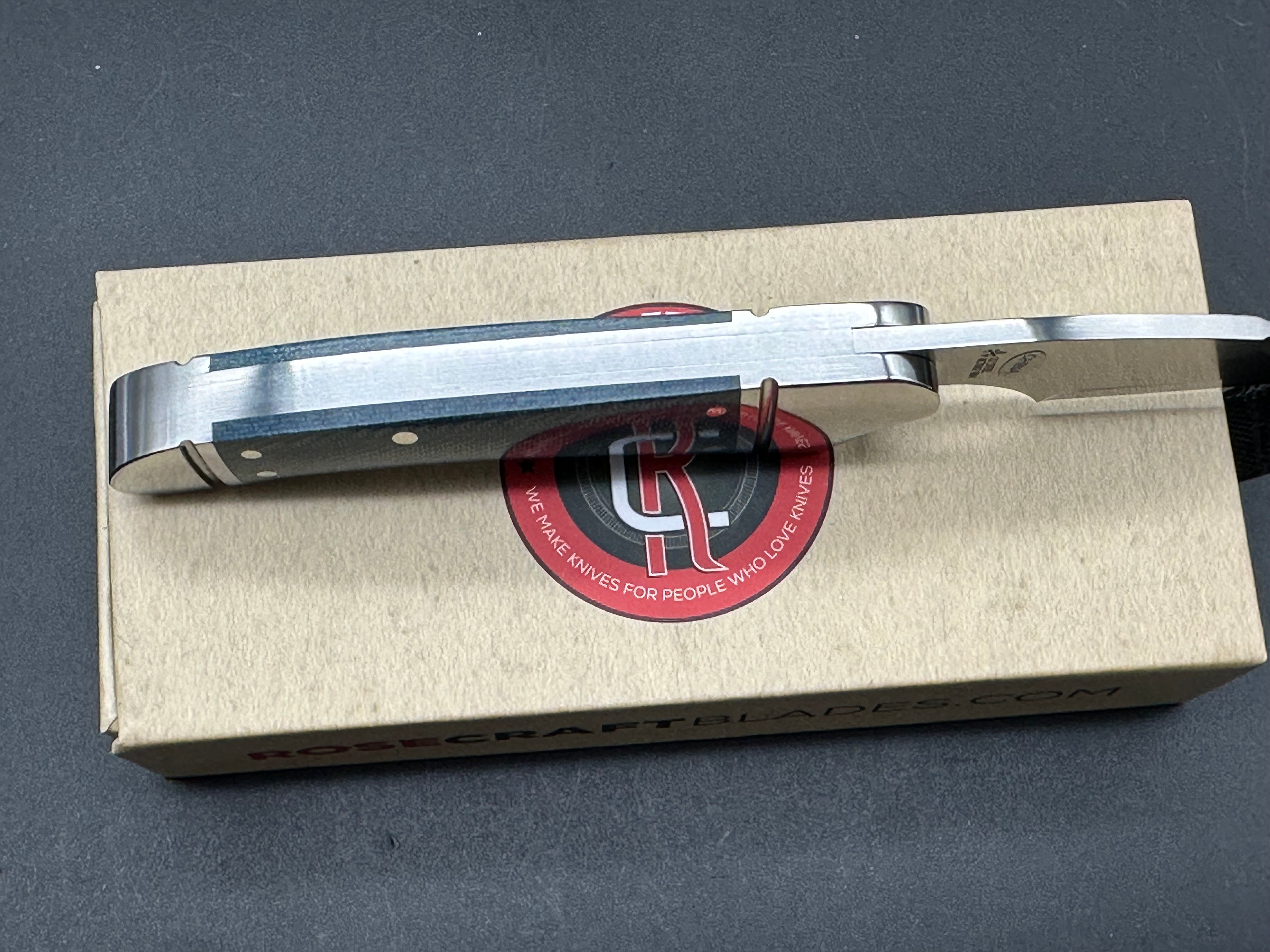 Rose Craft Zambezi, 2.5” D2 Satin Spear Point Blade, Blue Micarta and Steel Handle.