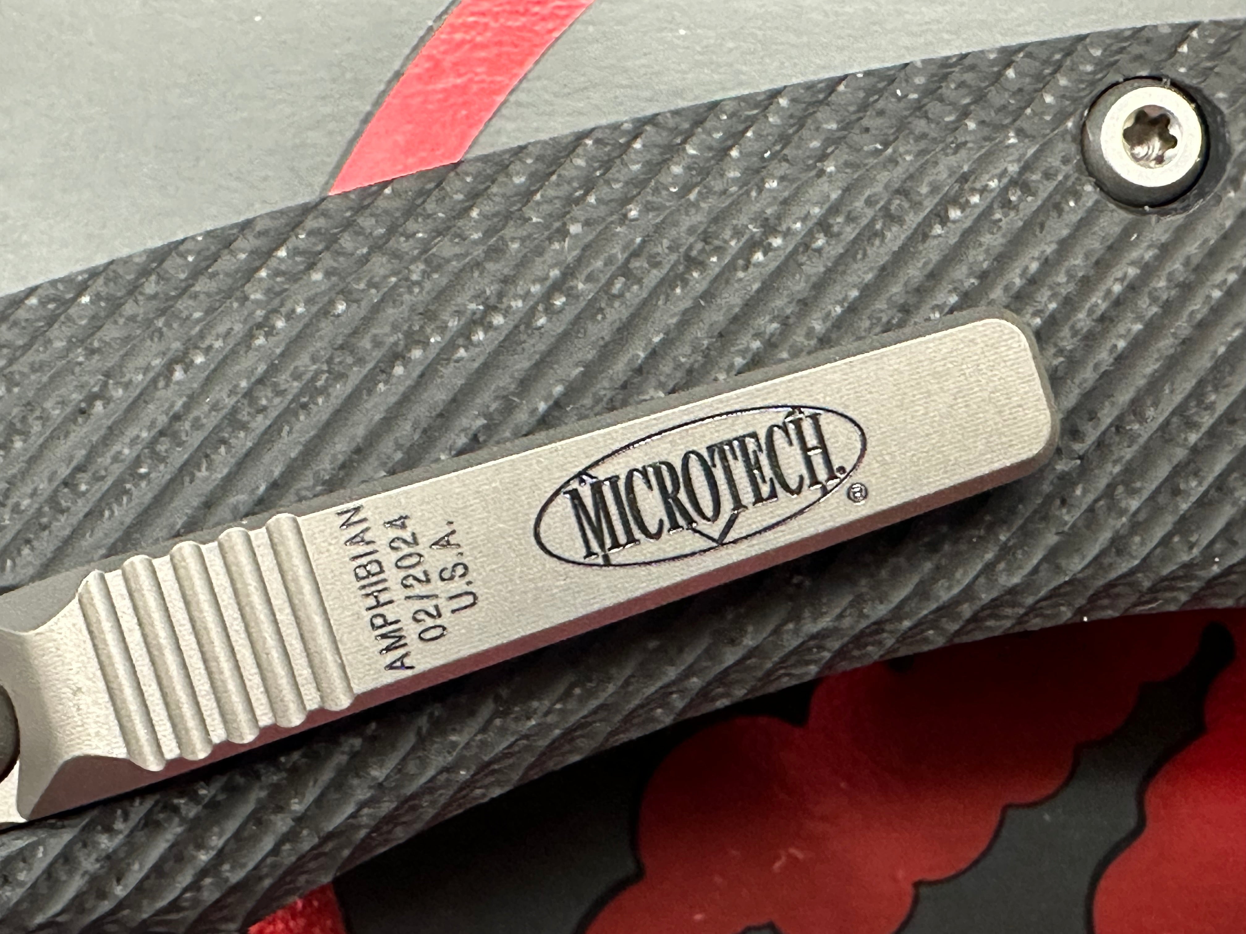 Microtech Amphibian Ram-Lok S/E Manual Knife Fluted Black G-10 (3.9" SW Serr)