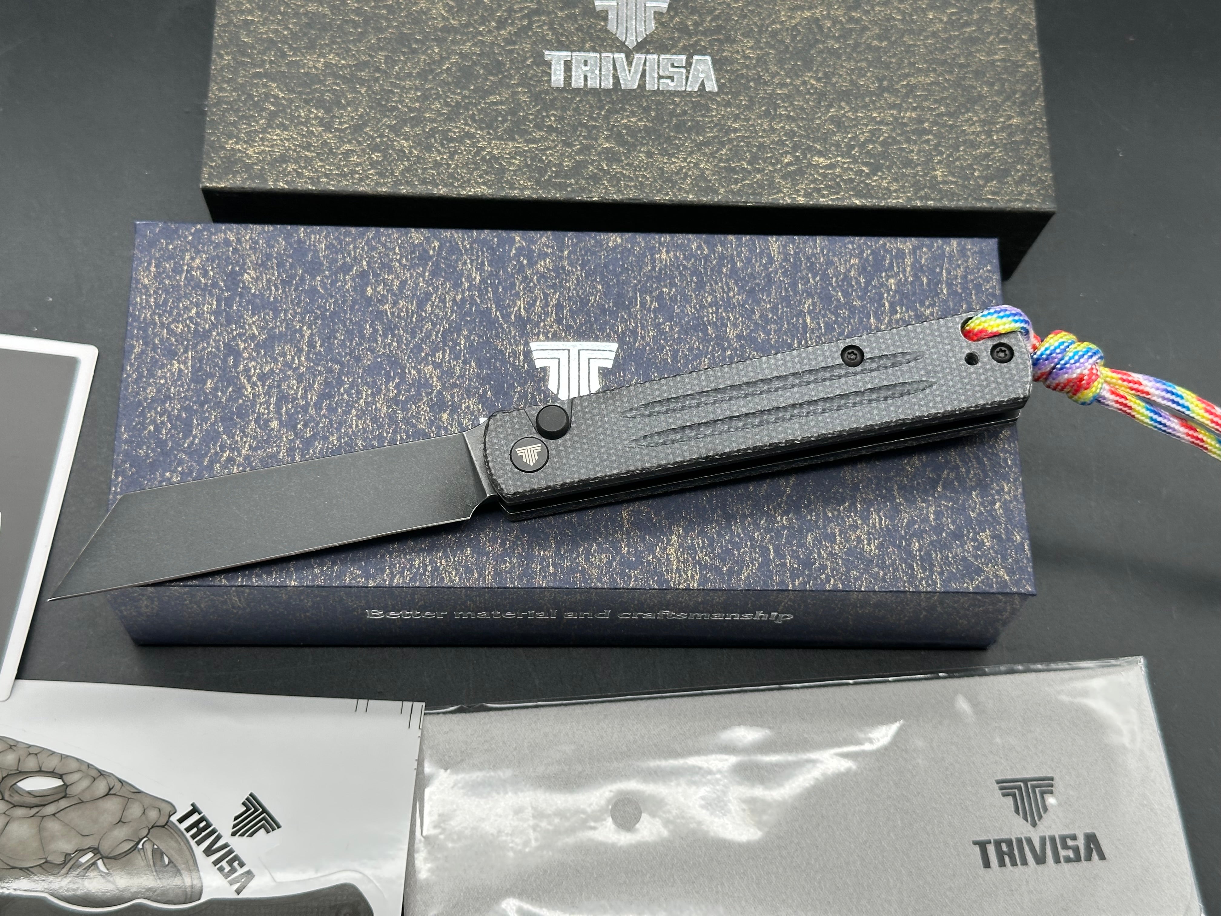 Trivisa Hydra button lock black micarta