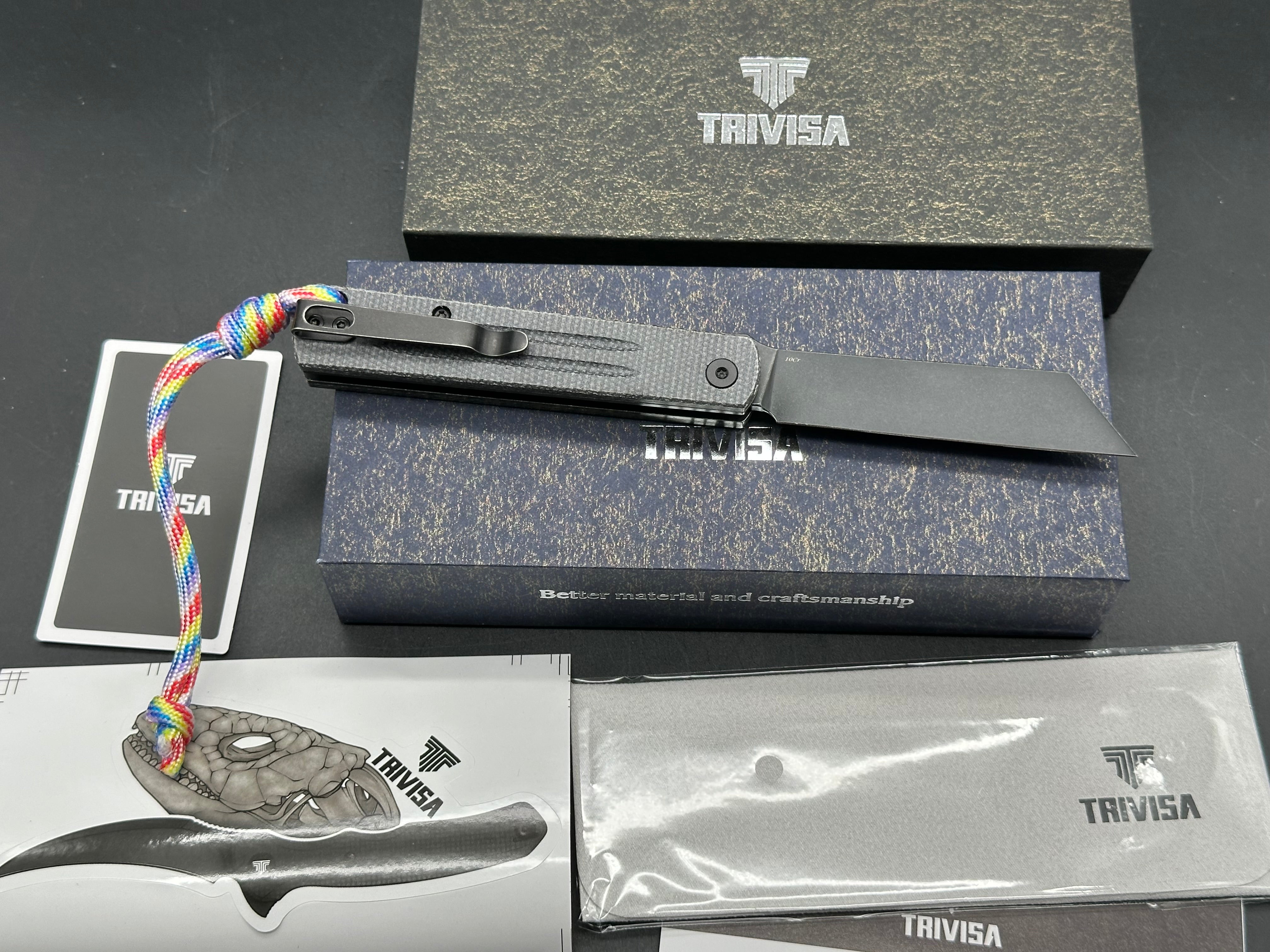 Trivisa Hydra button lock black micarta