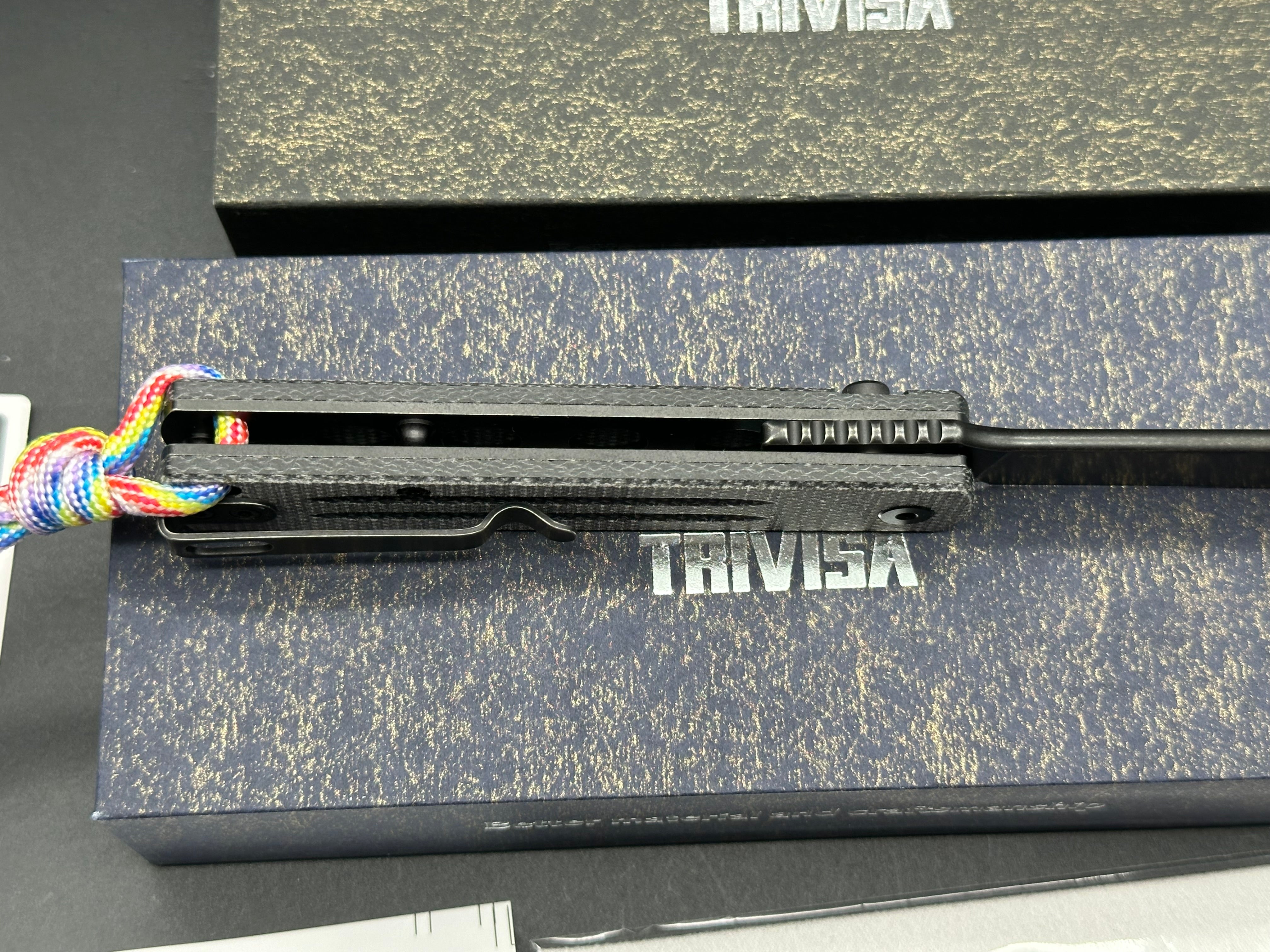 Trivisa Hydra button lock black micarta