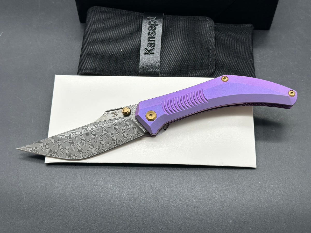 KANSEPT NAVAJA FOLDING KNIFE PURPLE ANODIZED TITANIUM HANDLE 3.6" DAMASCUS MODIFIED CLIP POINT PLAIN EDGE