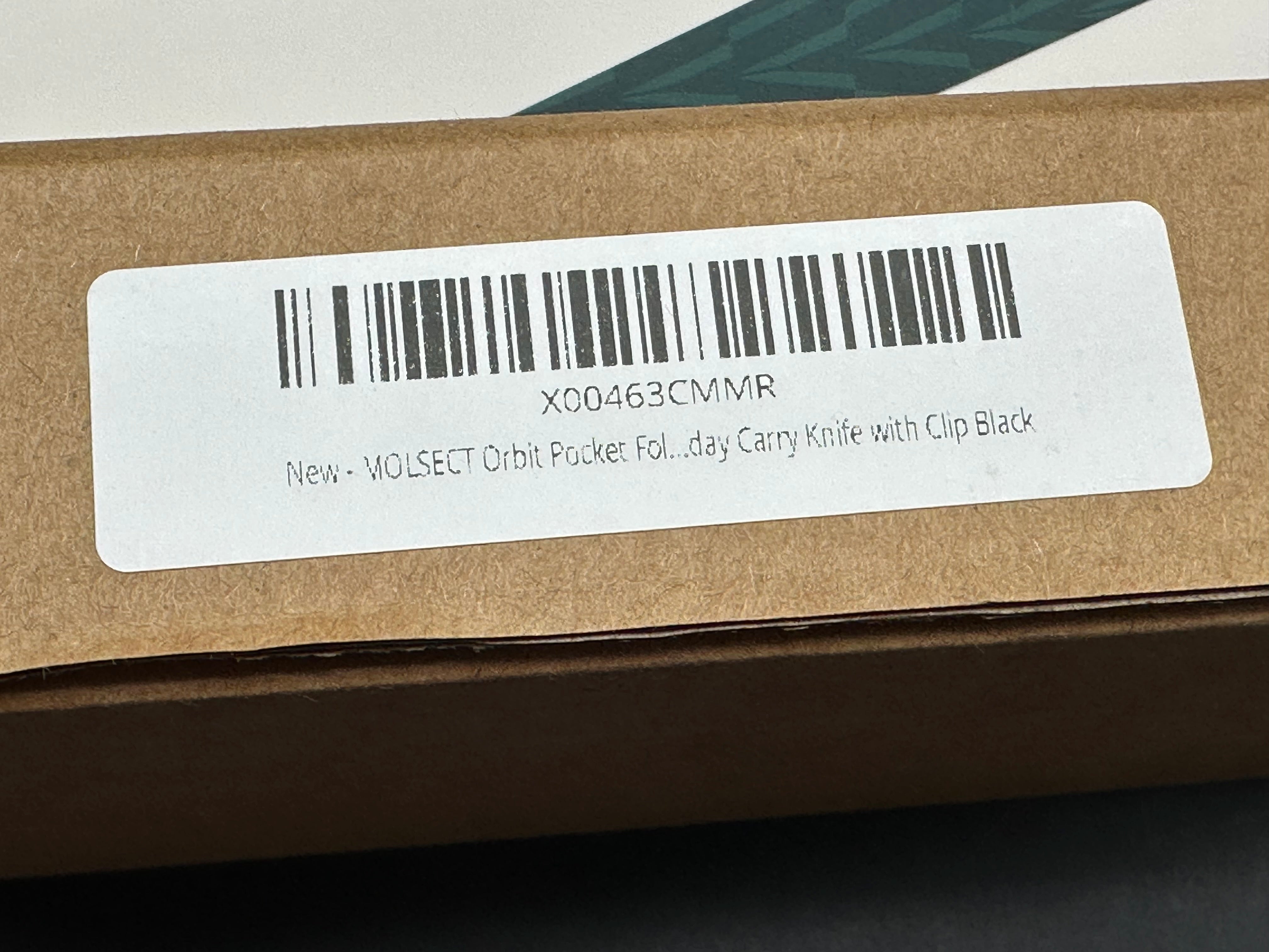 Molsect Orbit liner lock black G10 scales hollow grind 14C28N blade