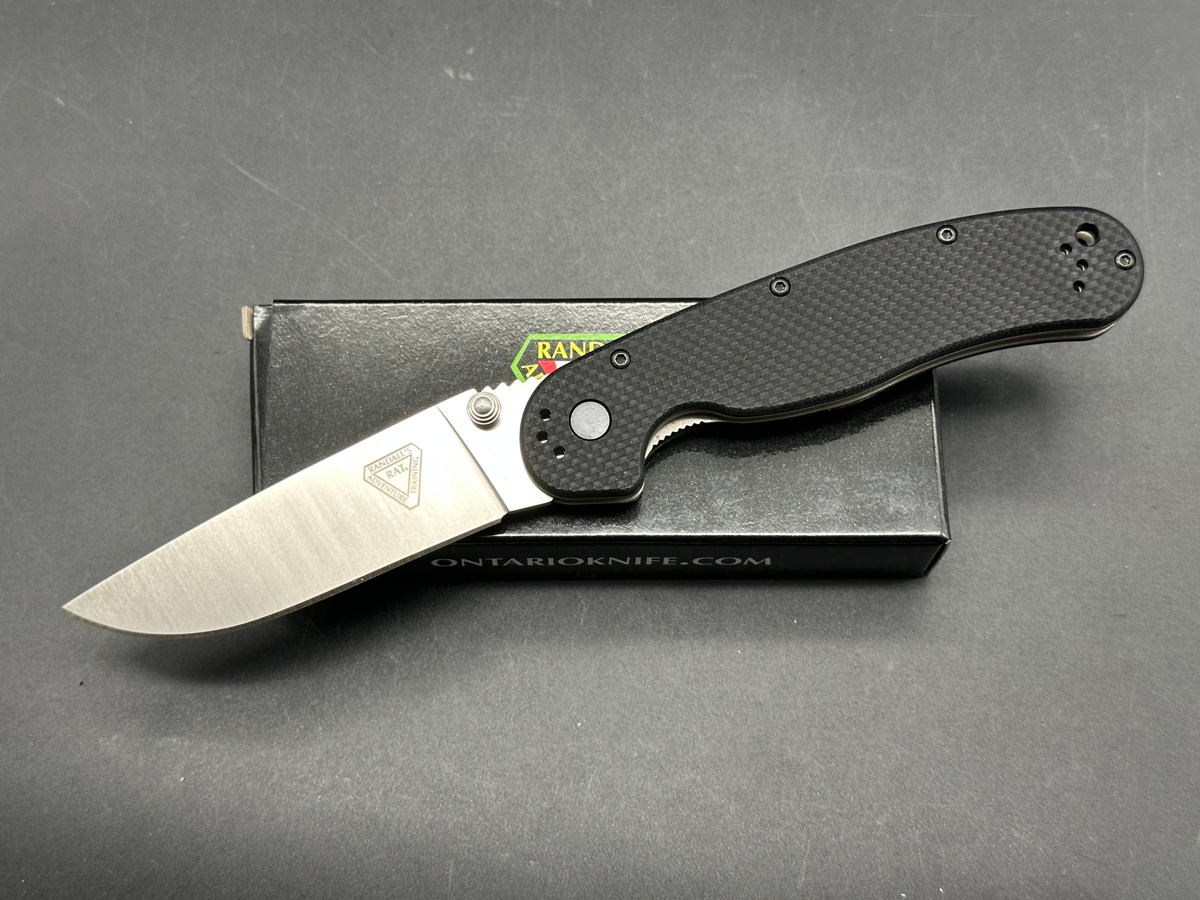 Ontario Rat 1.5 3.25" CPM MagnaCut Satin Blade with Black Textured G10 Scales